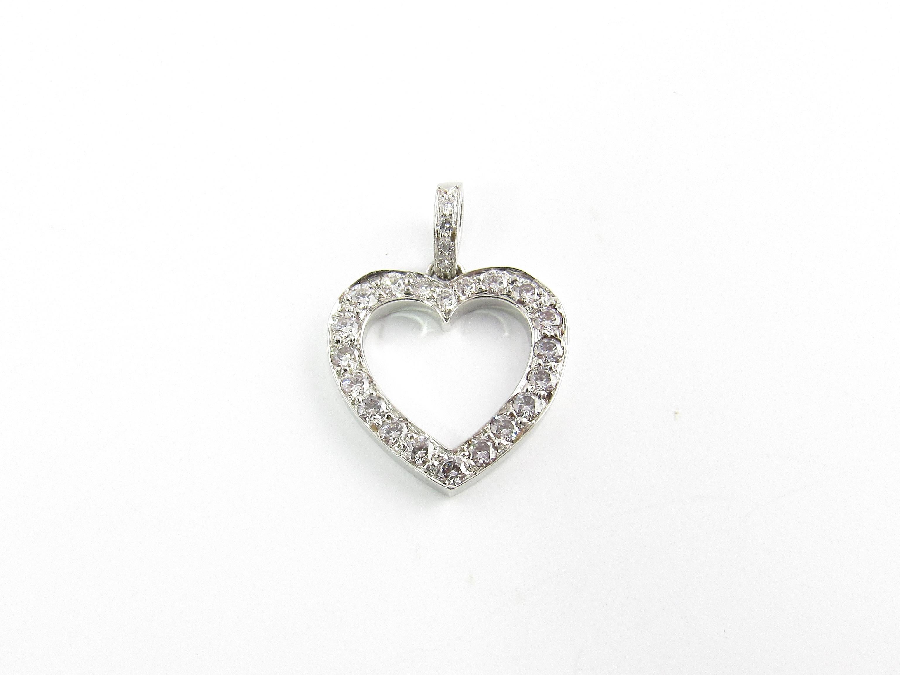 Tiffany & Co. Platinum Diamond Open Heart Pendant .65 cts

This gorgeous authentic Tiffany & Co open heart diamond pendant has lots of sparkle

The pendant hangs approx. 21 mm in length and is 16 mm wide and 2 mm thick.

It is set with 24 round