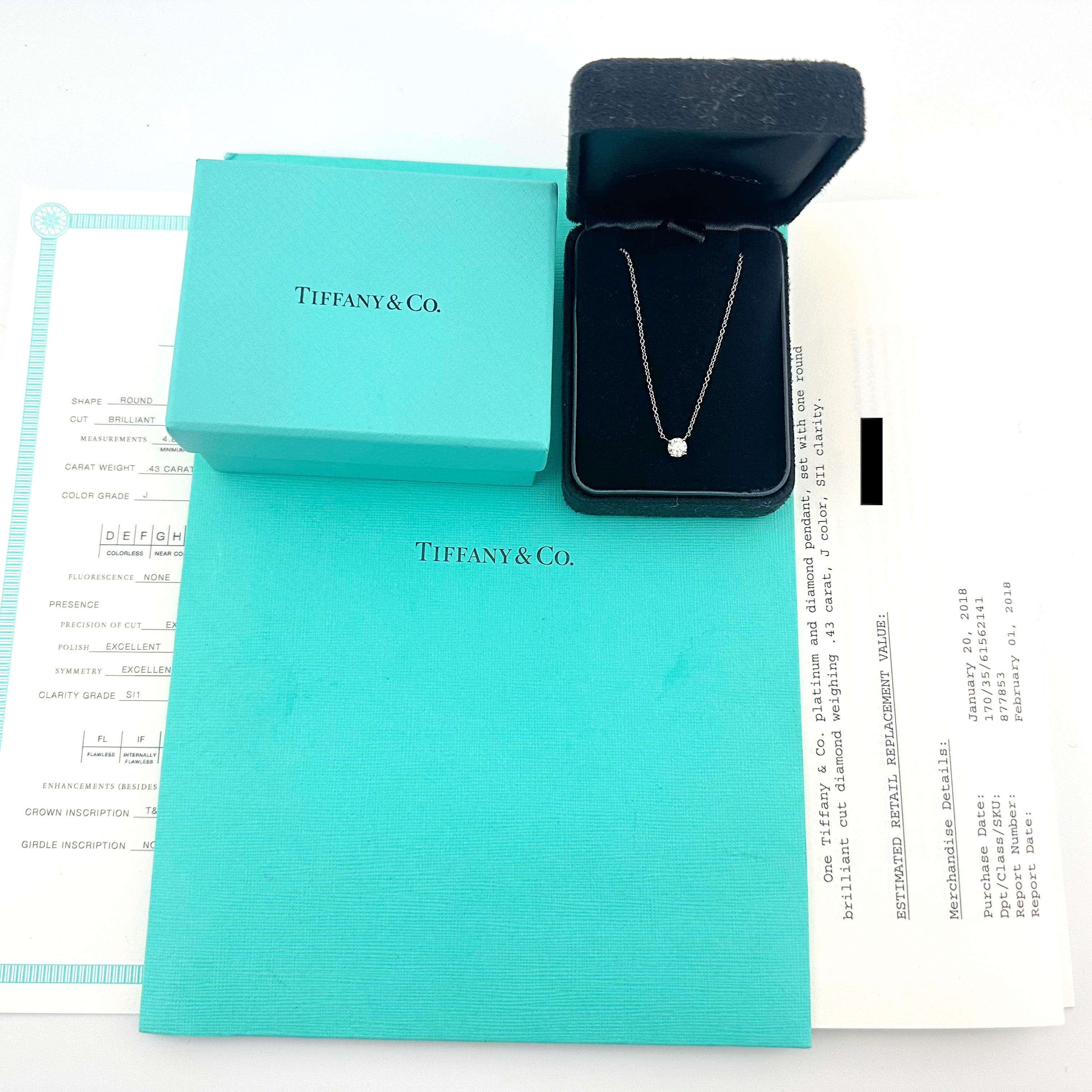 Tiffany & Co. Diamond Pendant Necklace
Style:  Prong Set
Metal:  Platinum
Measurements:  16' Inches
Main Diamond:  Round Brilliant Diamond 0.43 cts
Color & Clarity:  J, SI1
Diamond Inscription:  T&Co.S0524****
Inscription is also on the setting of