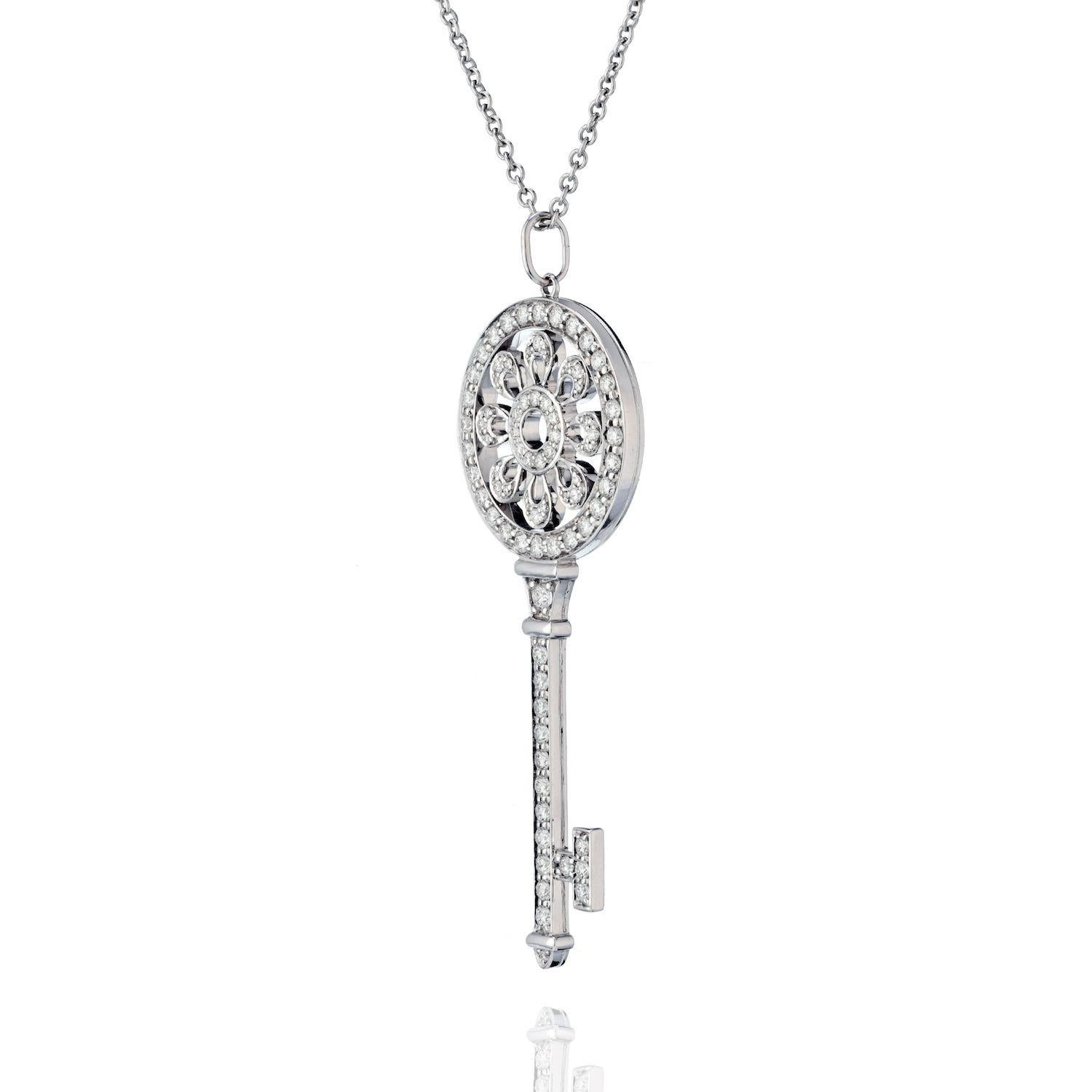 Modern Tiffany & Co. 18K White Gold Diamond Petals Key Pendant For Sale