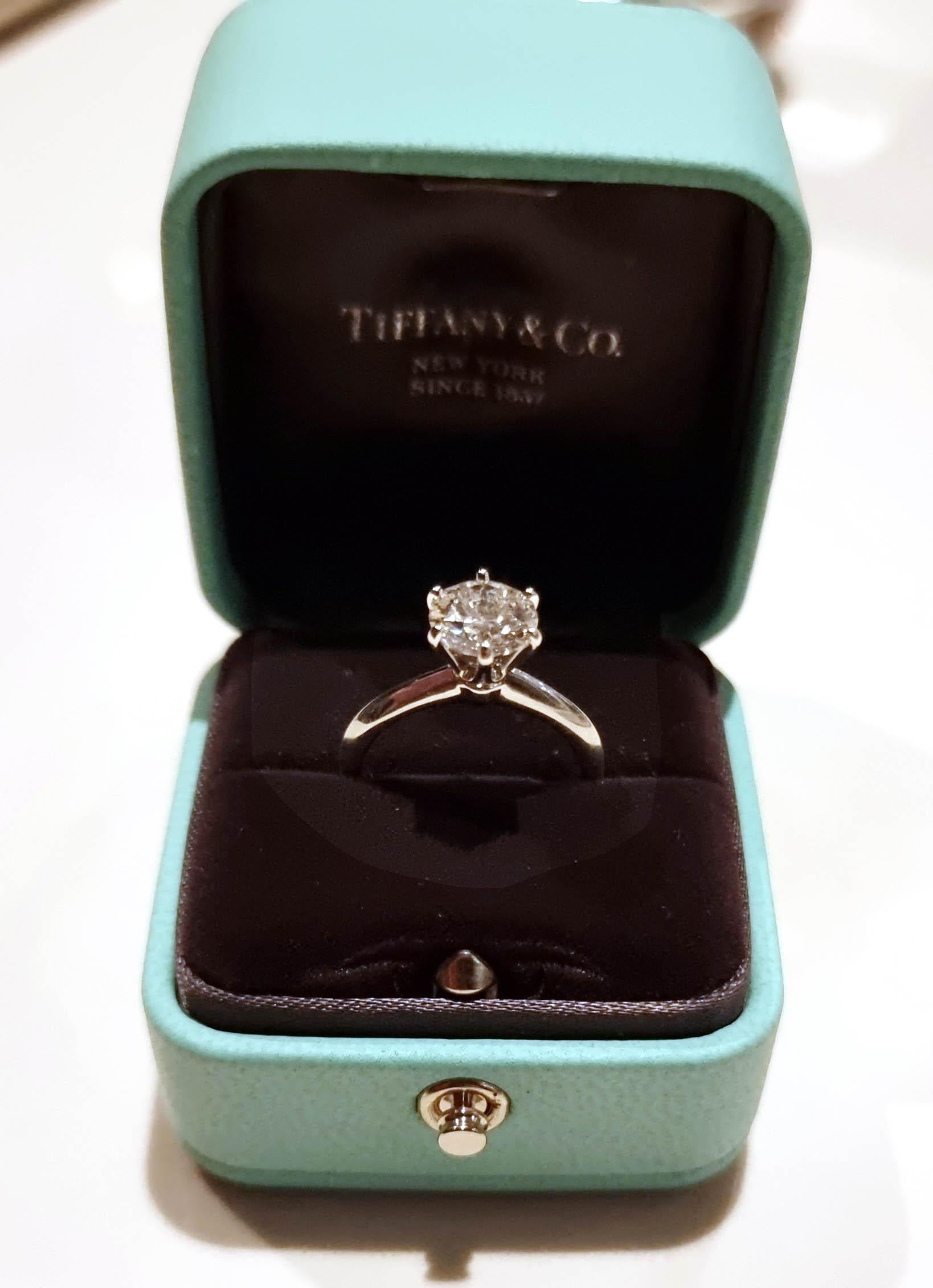 Unique features: 
Tiffany & Co platinum diamond engagement ring 1.64ct.
Metal: Platinum 
Carat: 1.64ct
Colour: I
Clarity: VS1
Cut: Round 
Weight: N/A
Engravings/Markings: Crown inscription T & C0 T& W08130184. The diamond is laser inscribed on the