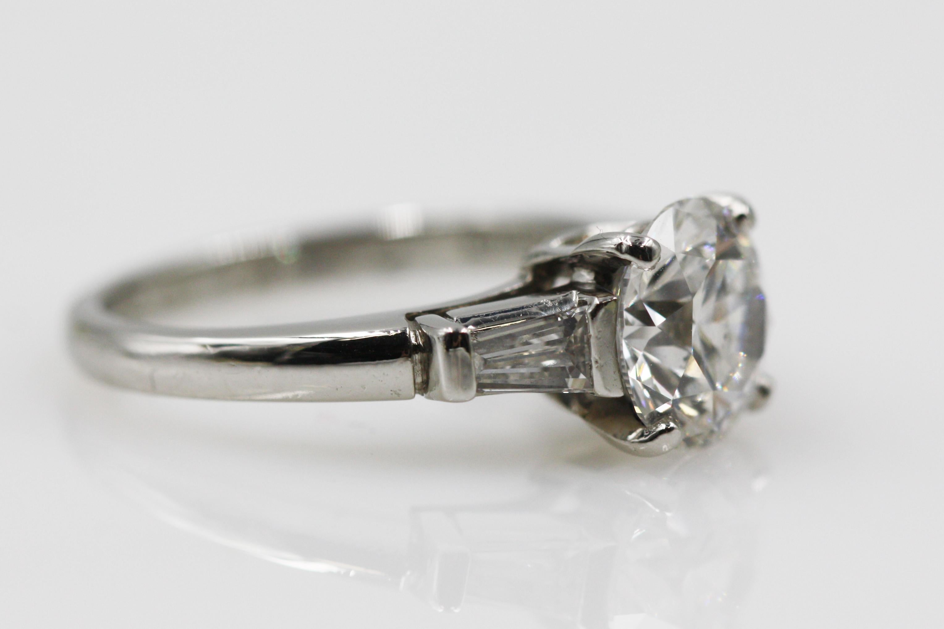 Tiffany & Co. Platinum Diamond Ring with Tapered Baguettes 2.10 Carat, VS1, E In Excellent Condition For Sale In New York, NY
