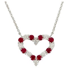 TIFFANY
Co. Platinum Diamond Ruby Heart Pendant Necklace