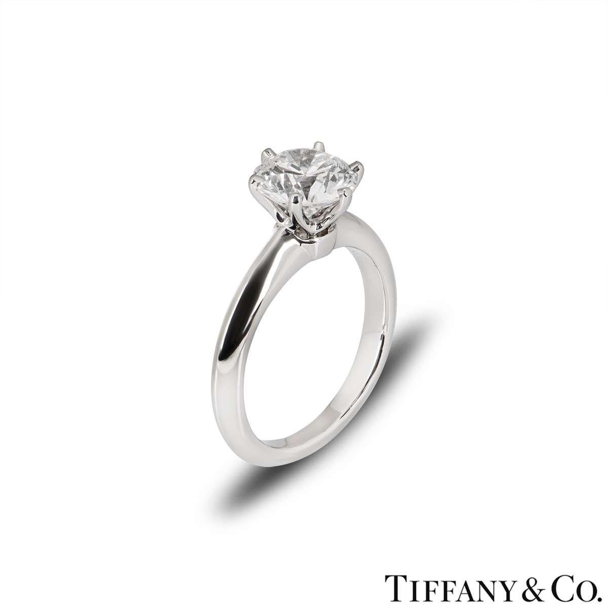 A beautiful platinum diamond ring by Tiffany & Co. from The Setting collection. The ring comprises of a round brilliant cut diamond in a 6 claw setting with a weight of 1.53ct, G colour and VVS2 clarity. The diamond scores an excellent rating in all