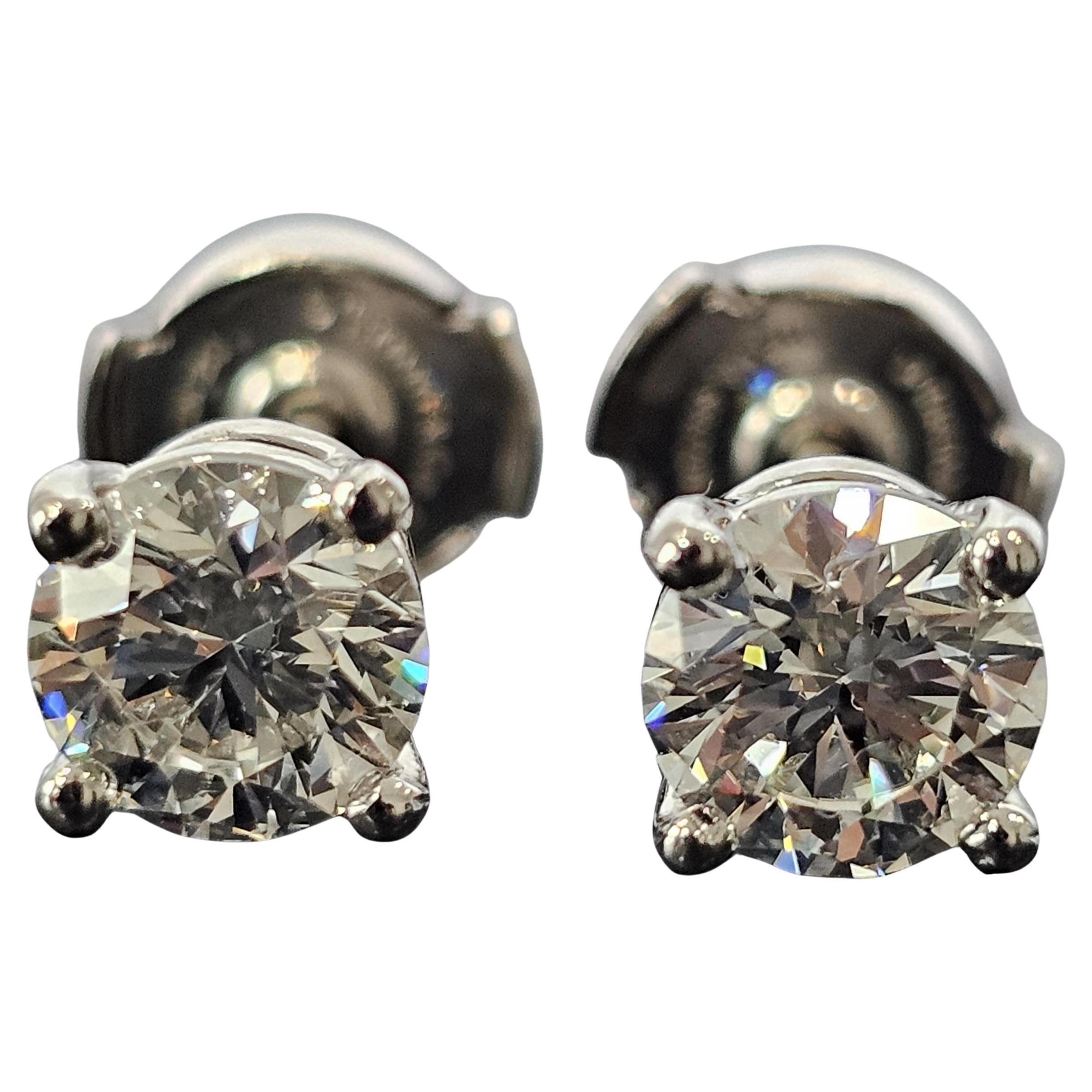 Tiffany
Co. Platinum Diamond Solitaire Studs Earrings 1.79ctw Certificates