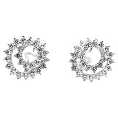 Tiffany 
Co. Platinum Diamond Swirl Earrings