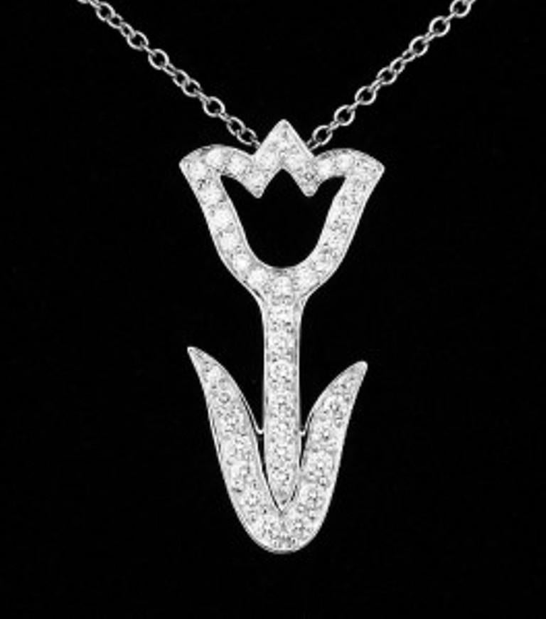 TIFFANY & Co. Collana con ciondolo a tulipano in platino e diamanti
 
Metallo: Platino
Peso: 4.60 grammi
Catena: 16