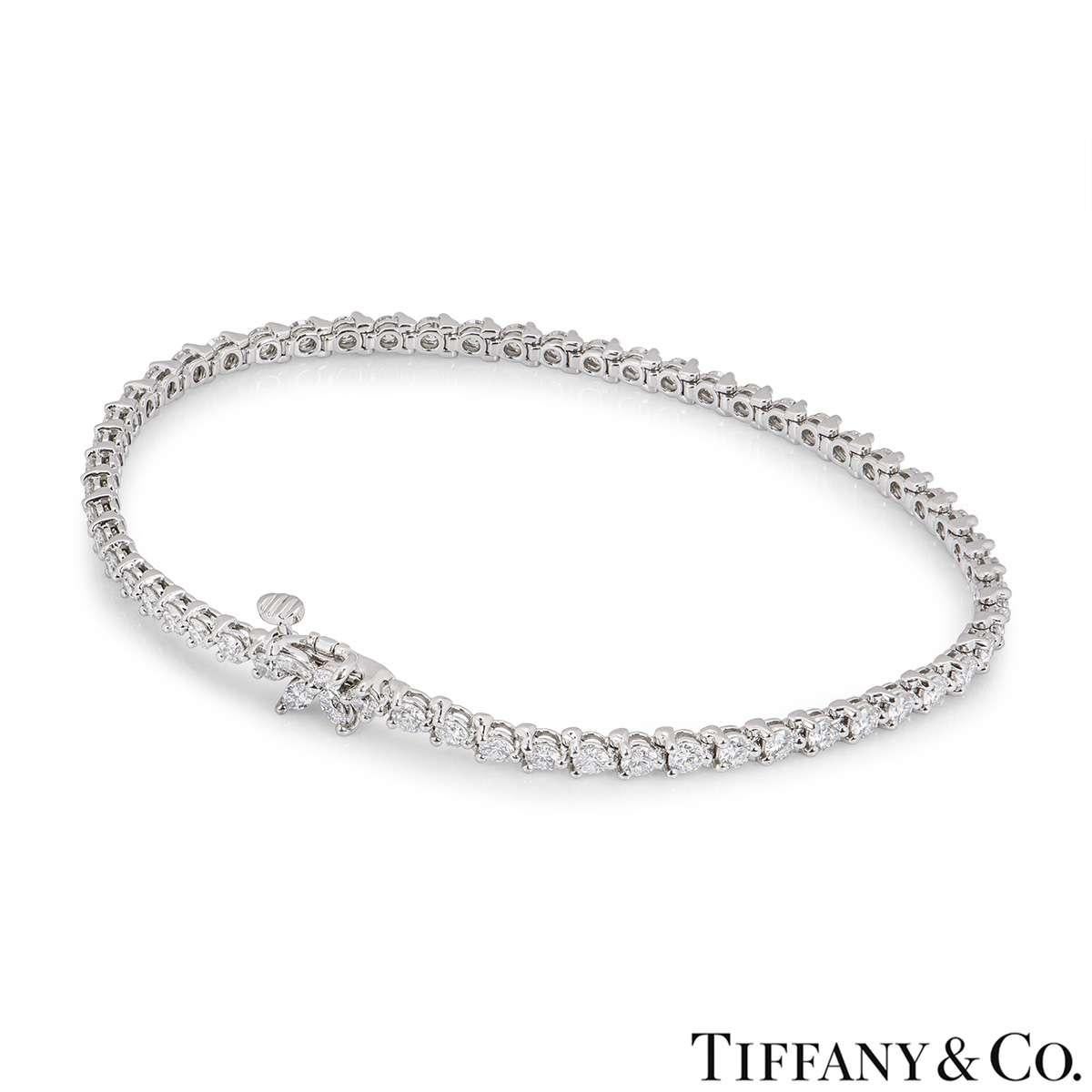 A stunning platinum diamond bracelet from the Victoria collection by Tiffany & Co. The bracelet is made up of 57 round brilliant cut diamonds and 4 marquise cut diamonds. The diamonds have a total weight of 3.08ct. The bracelet measures 7.5 inches