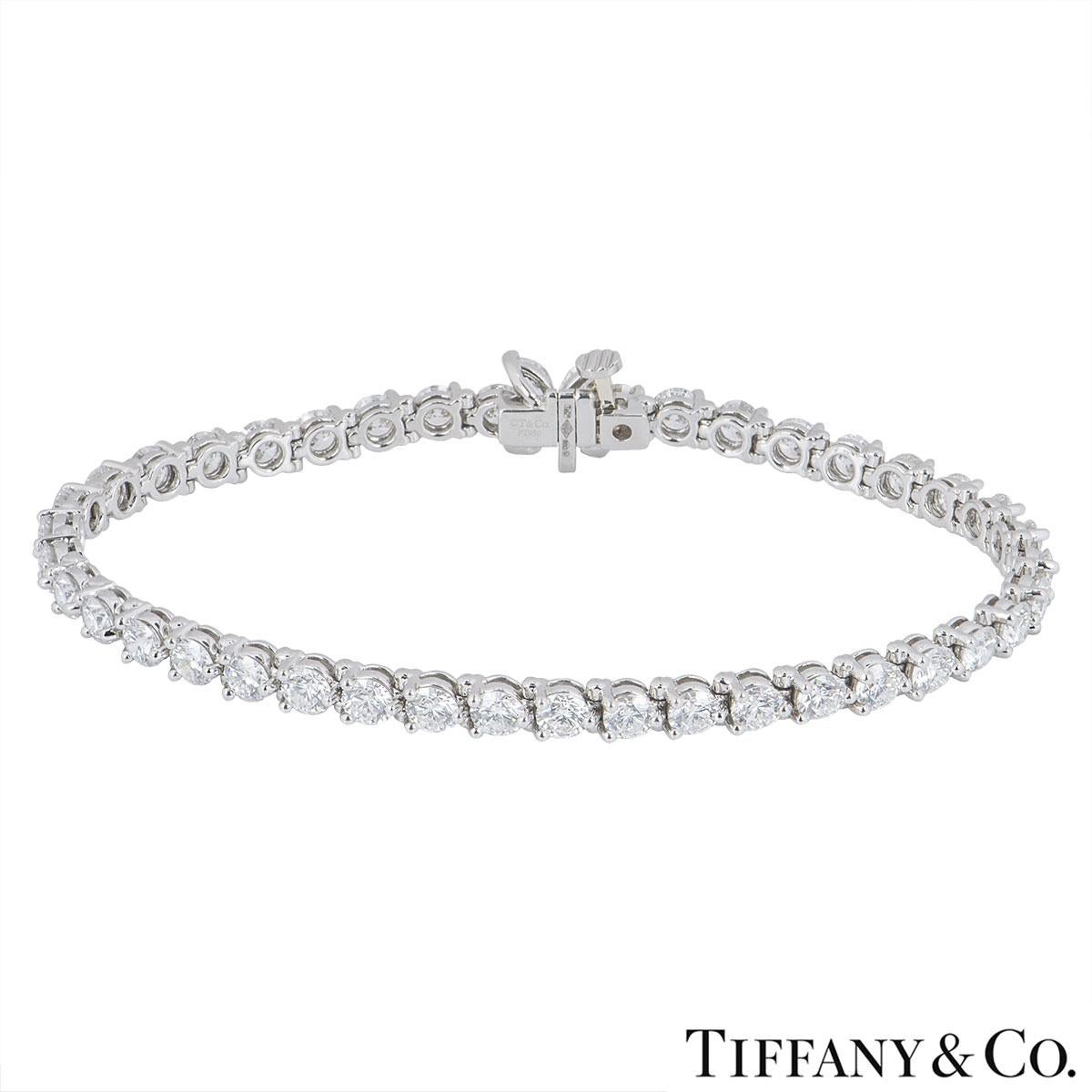 A stunning platinum diamond bracelet by Tiffany & Co. from the Victoria collection. The bracelet is made up of 40 round brilliant cut diamonds and 4 marquise cut diamonds. The round brilliant cut diamonds have a total weight of 6.22ct and the