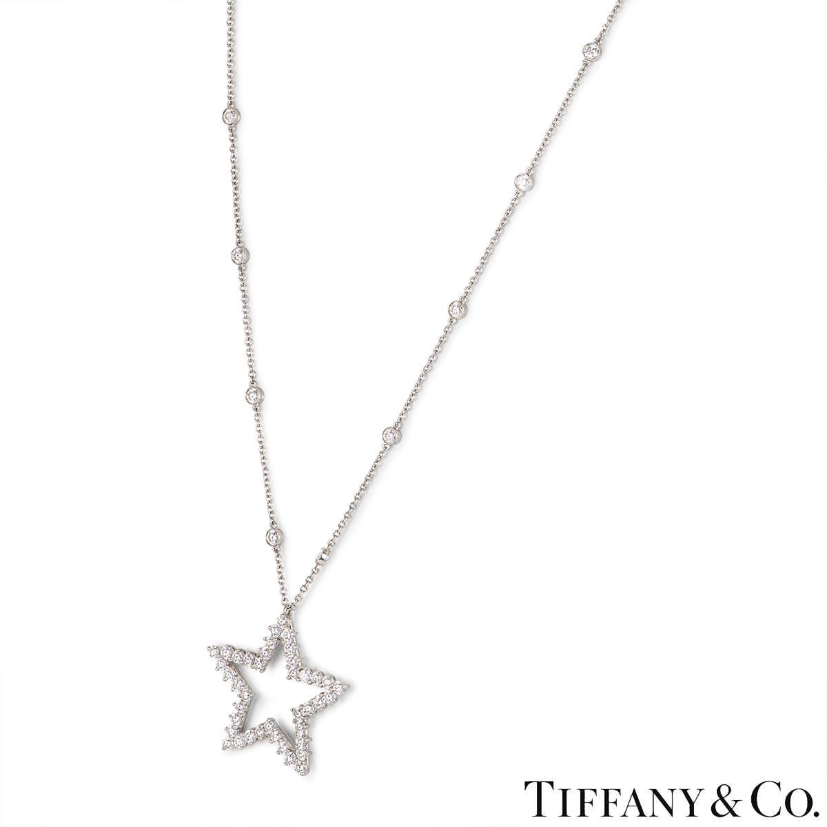 A beautiful platinum diamond star pendant necklace by Tiffany & Co. from the Diamonds By The Yard Collection. The pendant features an open star motif prong set with 40 round brilliant cut diamonds with an approximate weight of 3.20ct, F-G colour and