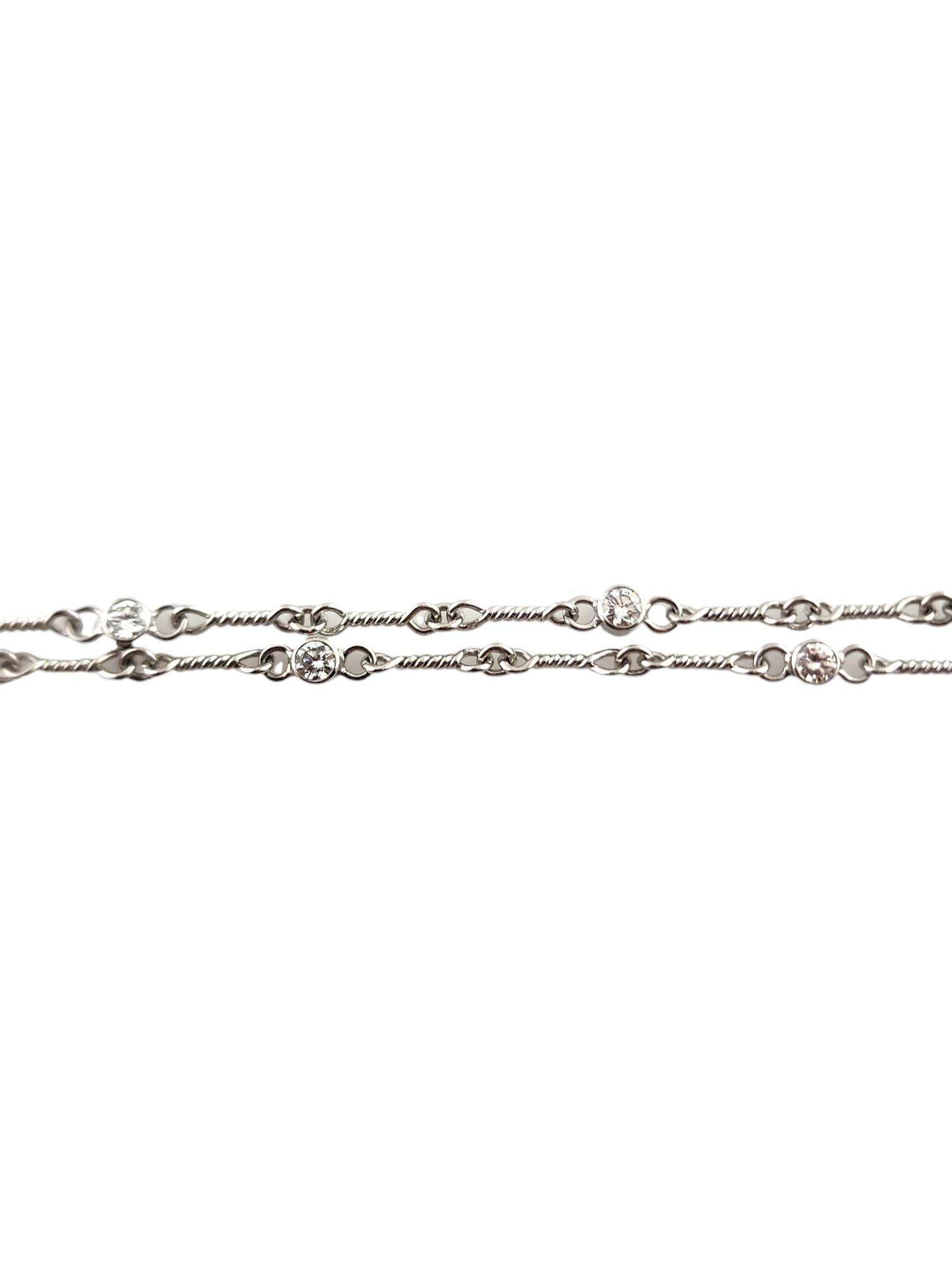 Tiffany & Co Platinum Diamond Necklace

This gorgeous platinum necklace was created by designer Tiffany & Co and decorated with 12 sparkling round brilliant cut diamonds!

Approximate total diamond weight: .90 cts

Diamond color: F - G

Diamond