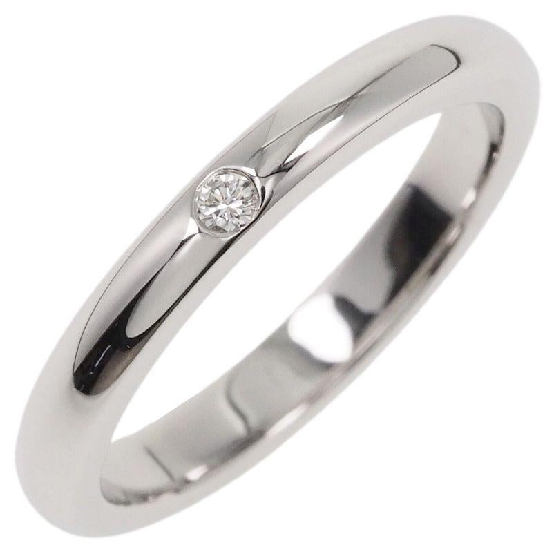 TIFFANY & Co. Platinum Elsa Peretti Diamond Band Ring 4.5

 Metal: Platinum
 Sizes: 4.5 
 Band Width: 2.8mm
 Weight: 4.80 grams 
 Diamond: One round brilliant diamond, carat total weight .02
 Hallmarked: TIFFANY&CO. PERETTI PT950
 Condition:
