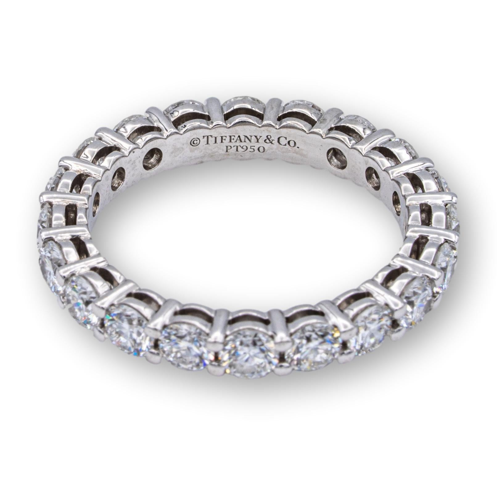 Tiffany & Co. Embrace band ring finely crafted in platinum with 20 round brilliant cut diamonds set in shared prongs all the way around weighing 1.64 cts. total weight ranging G-H color, VS clarity with an open gallery design.

Brand: Tiffany &