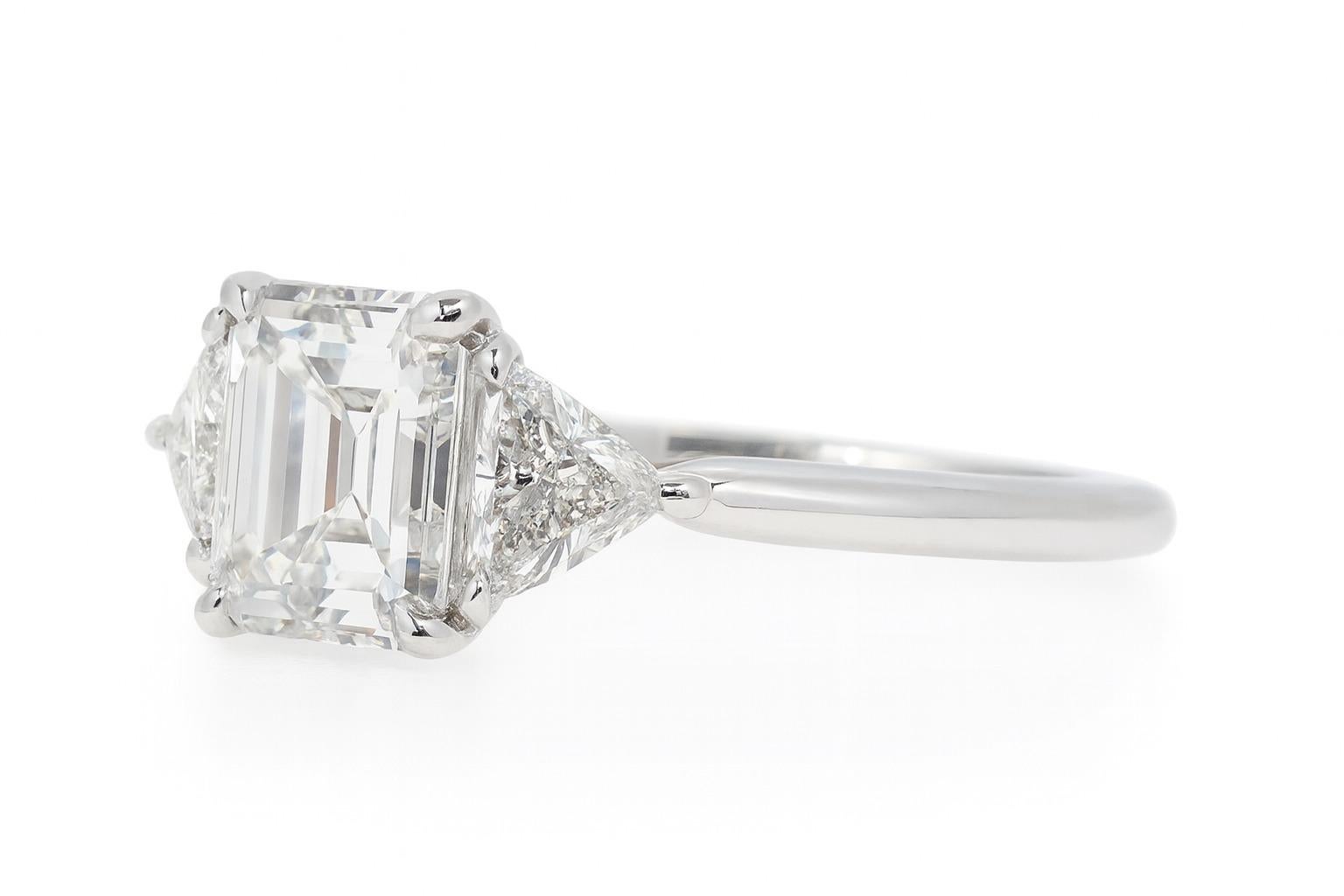 Tiffany & Co. Platinum Emerald Cut and Trillion Diamond Engagement Ring In Excellent Condition For Sale In Chicago, IL