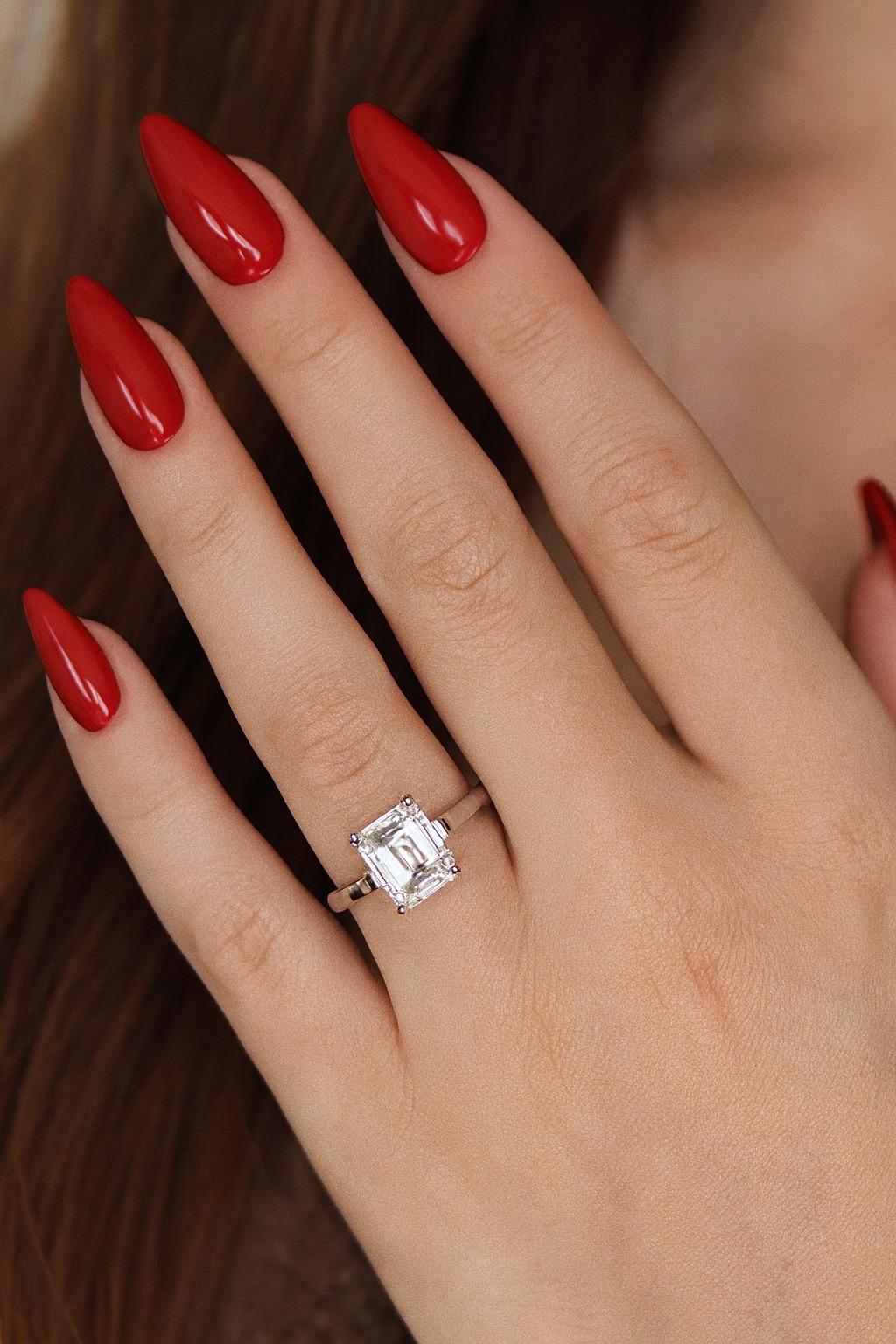 Tiffany & Co. Platinum Emerald Cut Diamond Solitaire Engagement Ring In Excellent Condition For Sale In Chicago, IL