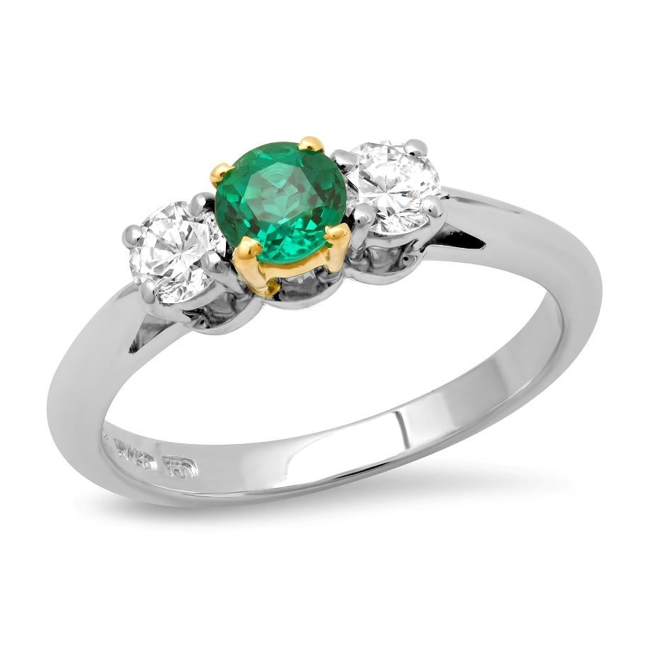 TIFFANY & Co. Platinum Emerald Diamond Three Stone Engagement Ring 6

Metal: Platinum, and 18K gold prongs (for emerald)
Size: 6
Weight: 4.40 grams
Emerald: 1 round emerald, carat total weight .54
Diamond: 2 round brilliant diamonds, .17 /each,