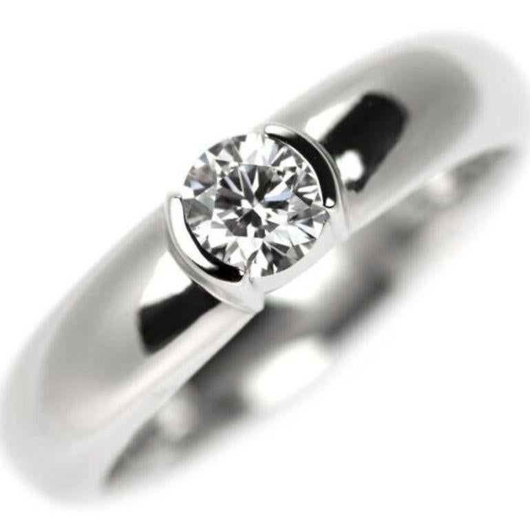 TIFFANY & Co. Platinum Etoile .27ct Solitaire Diamond Engagement Ring 4.75

Metal: Platinum
Size: 4.75
Band width: 4mm
Weight: 7.10 grams
Diamond: round brilliant diamond, carat total weight .27, color G, clarity VVS1
Hallmark: 