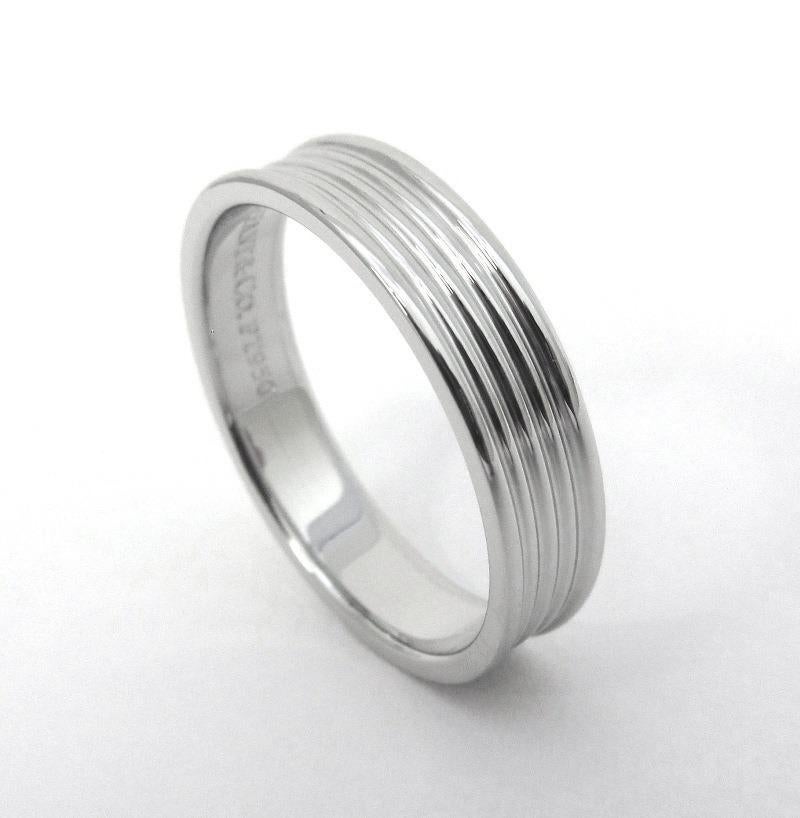 TIFFANY & Co. Platinum Five Row Wedding Band Ring 9.5

Metal: Platinum 
Size: 9.5
Band Width: 5mm 
Weight: 8.20 grams
Hallmark: ©TIFFANY&CO. PT950 
Condition: Excellent condition

Limited edition, no longer available for sale in Tiffany