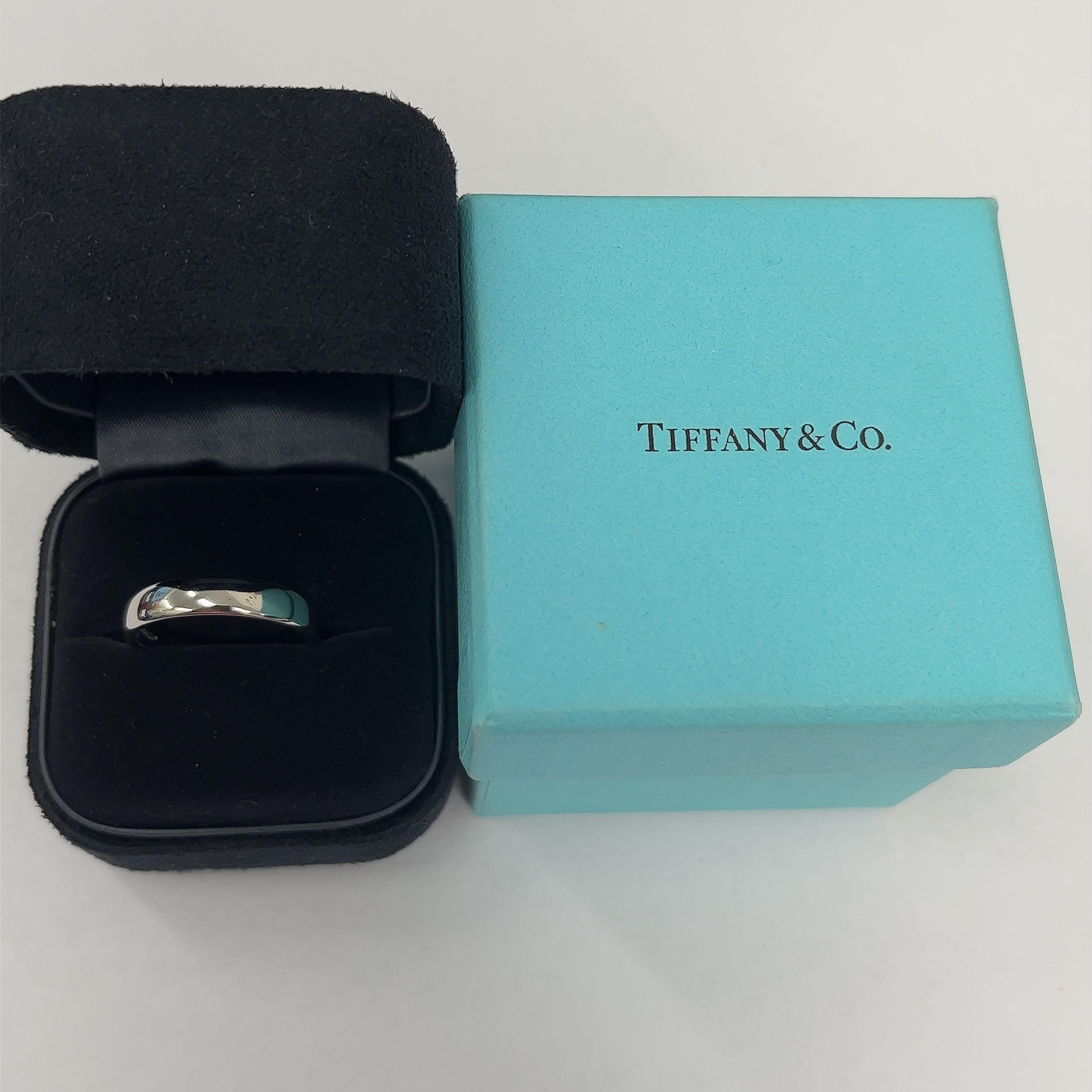 The Tiffany & Co. Platinum Forever Wedding Band, measuring 4.6mm, is a timeless symbol of eternal love. Crafted in platinum, its enduring design represents a commitment that lasts a lifetime, embodying the promise of forever.


Width of Band: