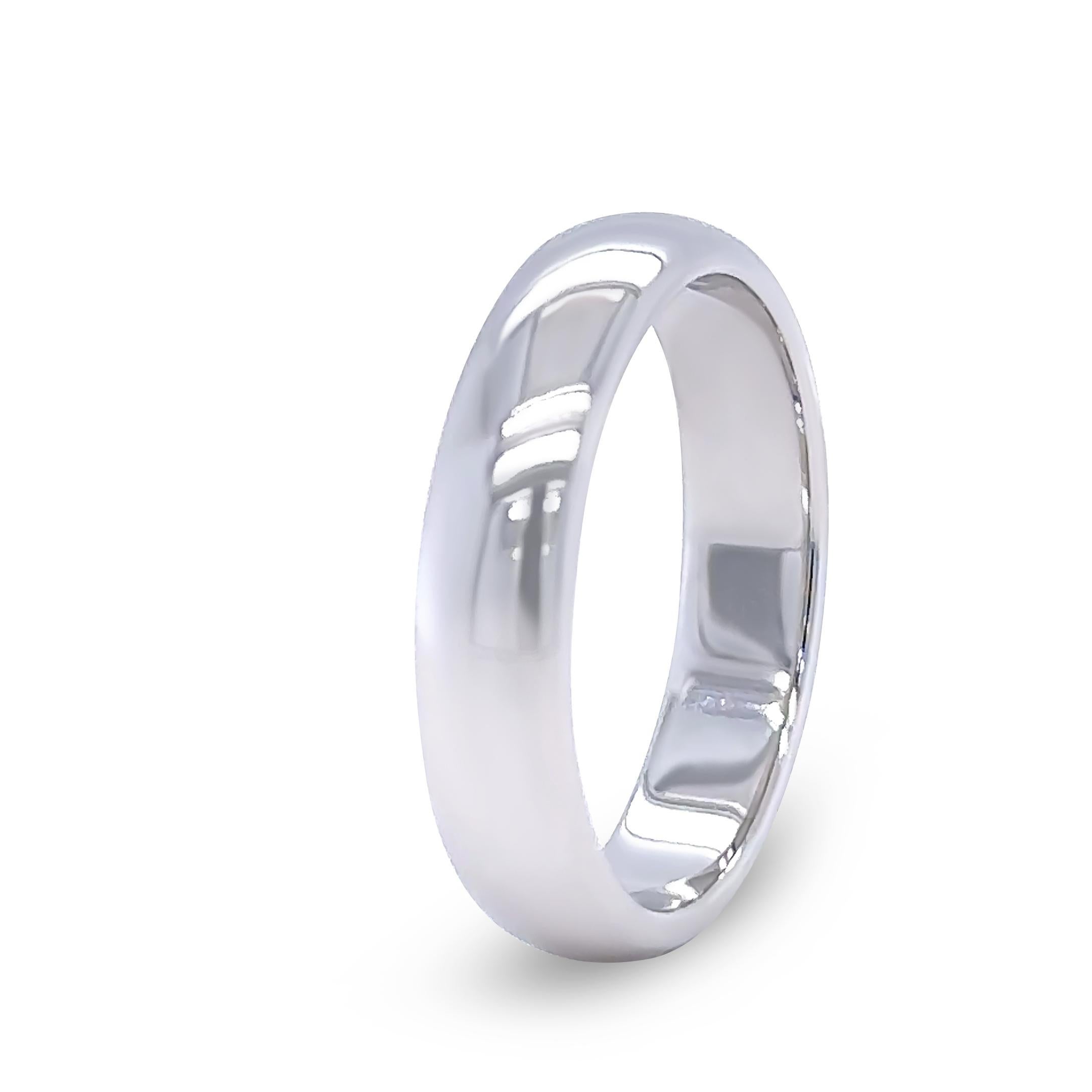 This elegant Tiffany & Co. Forever wedding band is crafted in luxurious platinum with a comfort fit design, offering timeless sophistication and enduring quality. The sleek, polished band reflects the brand’s refined craftsmanship and makes for a