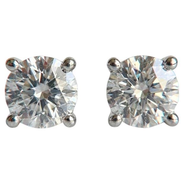 Tiffany 
Co. Platinum GIA-Certified 2.00 Carat VVS2–H Diamond Stud Earrings