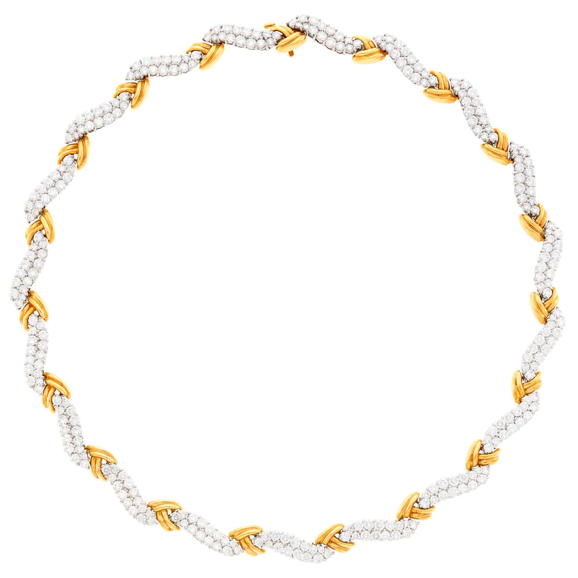 Tiffany & Co. Platinum, Gold and Diamond Necklace This necklace has curved platinum links
of 285 roundvery fine quality diamonds approx. 18.50 carats,  joined by overlapping polished 18k yellow gold ribbed links. 
Width of gold links 5/16 inch and