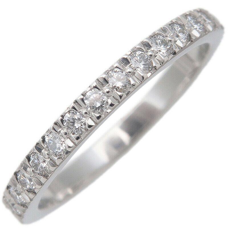 TIFFANY & Co. Platinum Half Circle Diamond Novo Band Ring 5.5

Metal: Platinum
Size: 5.5
Band Width: 2.1mm
Diamond: round brilliant diamonds, carat total weight .24 
Hallmark: ©TIFFANY&CO. PT950
Condition: Excellent condition, like new, comes with