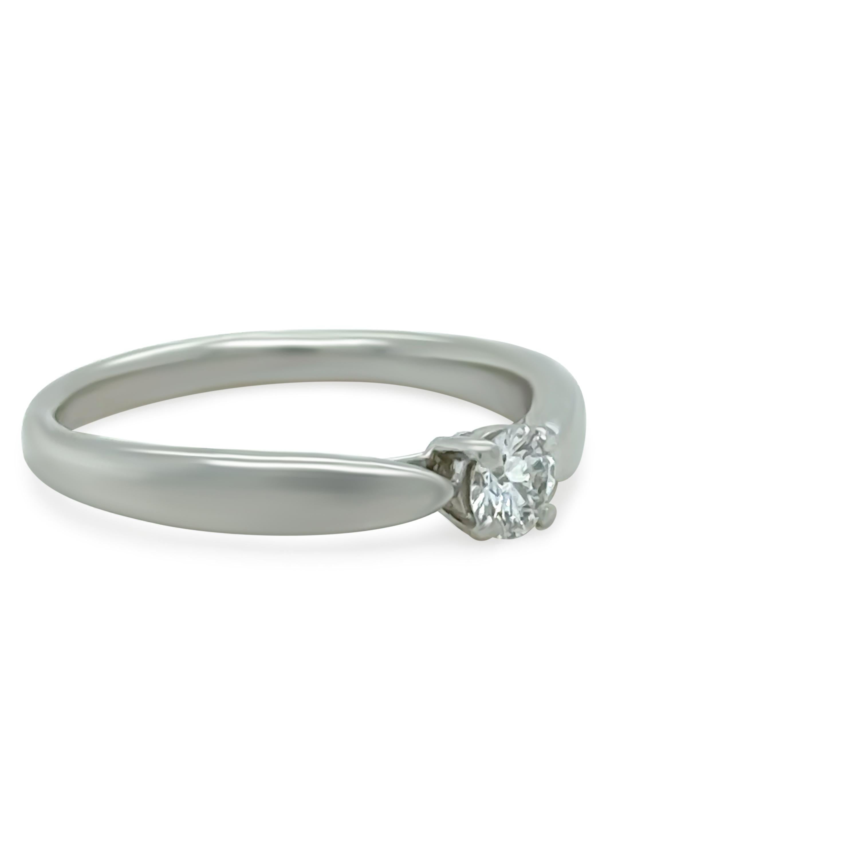 This elegant Tiffany & Co. Harmony ring is crafted in platinum, featuring a 0.17ct round brilliant-cut diamond. The centre diamond is graded F colour and VS2 clarity, offering exceptional brilliance in a timeless, delicate setting.

Metal: Platinum