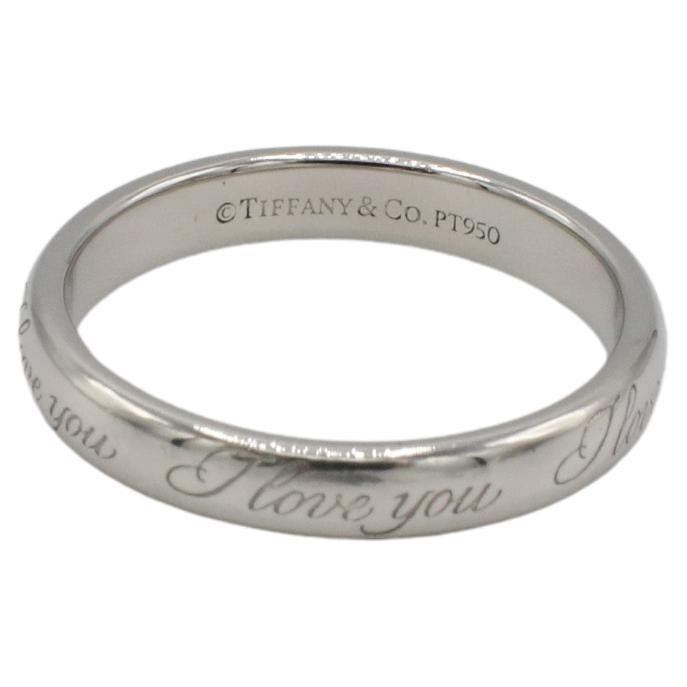 Tiffany & Co. Platinum I Love You Wedding Band Ring 3mm
Metal: Platinum
Weight: 4.18 grams
Width: 3mm
Size: 5 (US)
Signed: ©Tiffany & Co. PT950
ADD F35000315