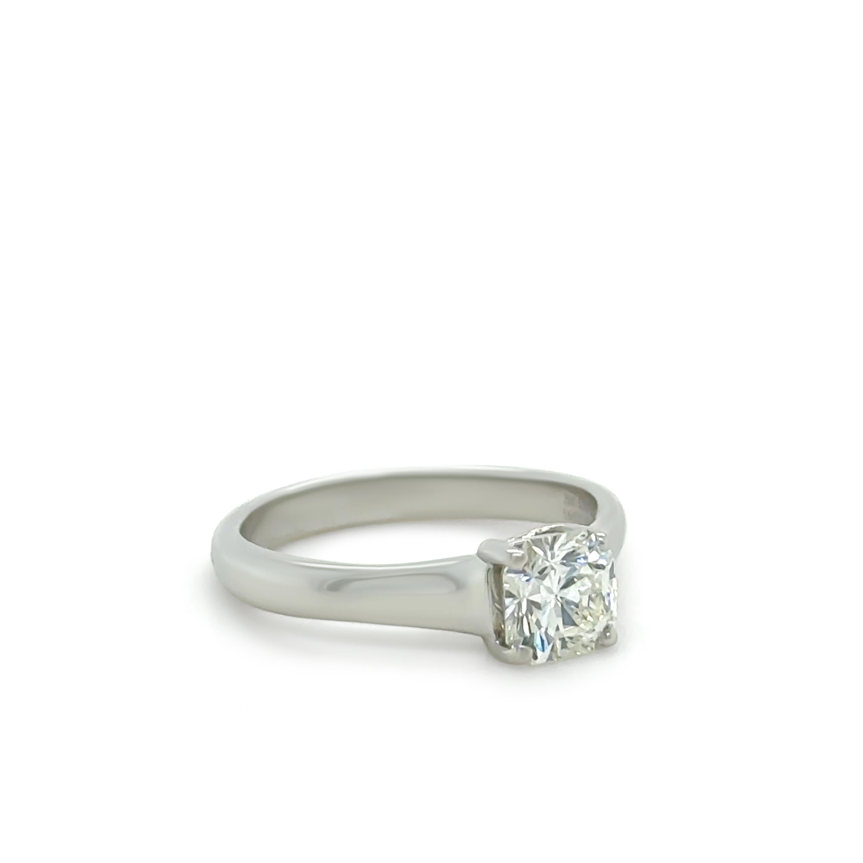 This exquisite Tiffany & Co. diamond ring features the rare and discontinued Lucida cut, four-claw set in platinum on a tapered band (3.5mm to 2.7mm). The centre diamond weighs 0.75 carat, measuring 5.48 x 5.42 x 3.60mm, with exceptional quality