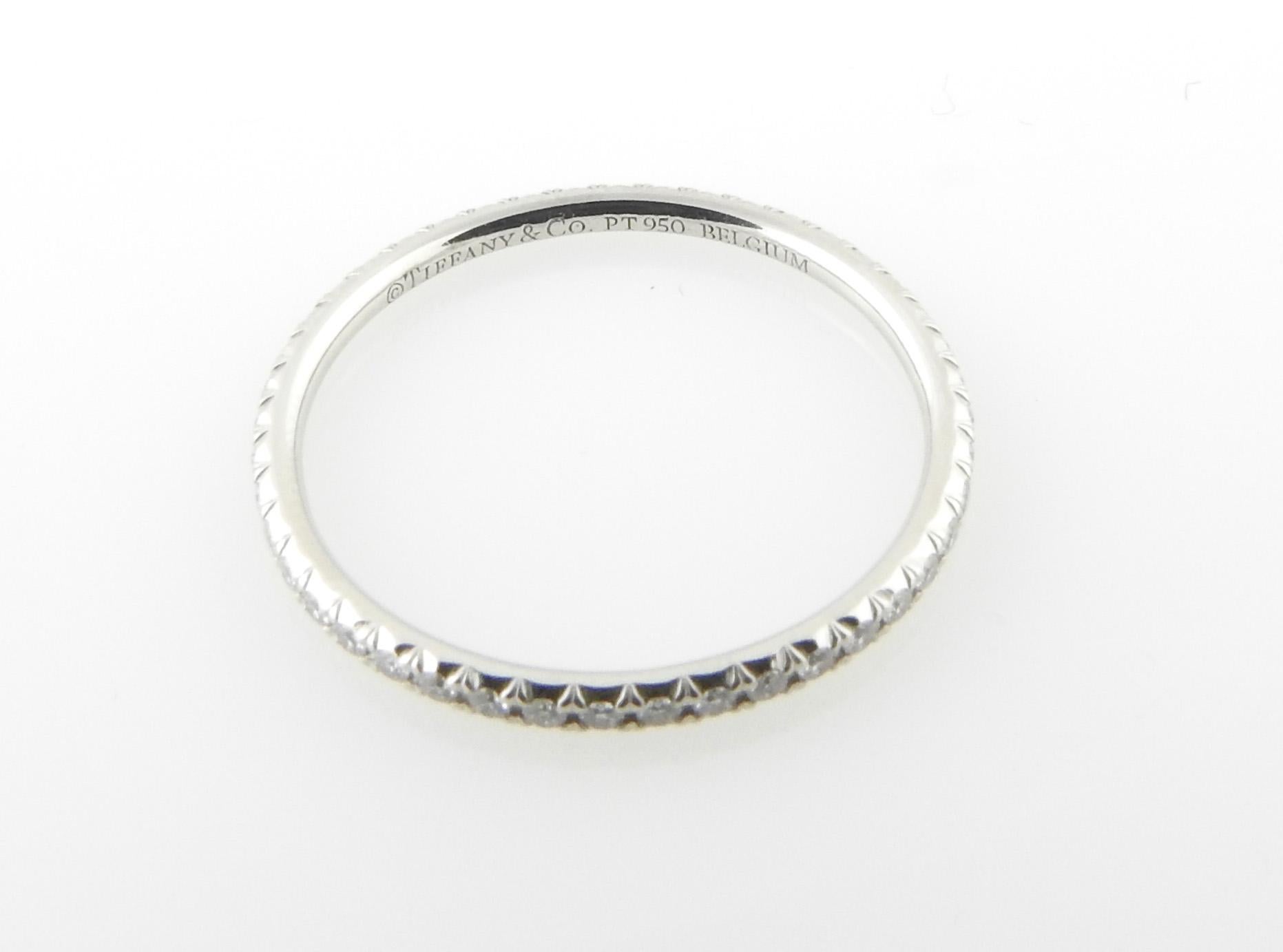 Tiffany & Co. Platinum Metro Diamond Eternity Band

This classic Tiffany eternity band is set in platinum.

Size 7

Diamonds are each individually set in 4 prongs.

Diamonds are of VS1 clarity and G color
Approx. .20cts total diamond weight

The