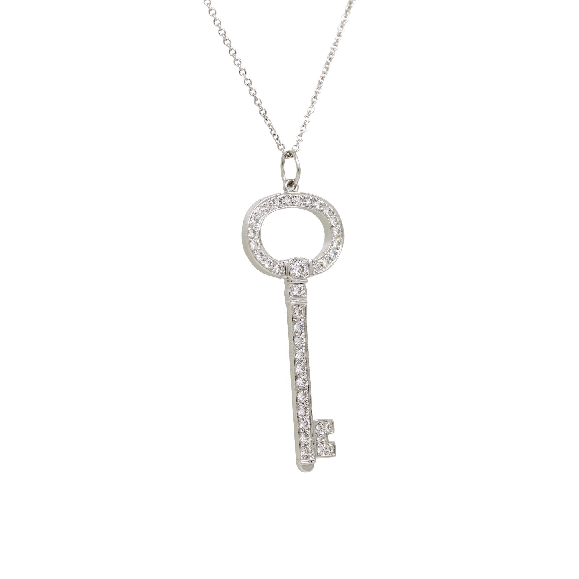 Modernist Tiffany & Co. Natural 0.58 Carat Diamond Oval Key Platinum Necklace In Stock For Sale