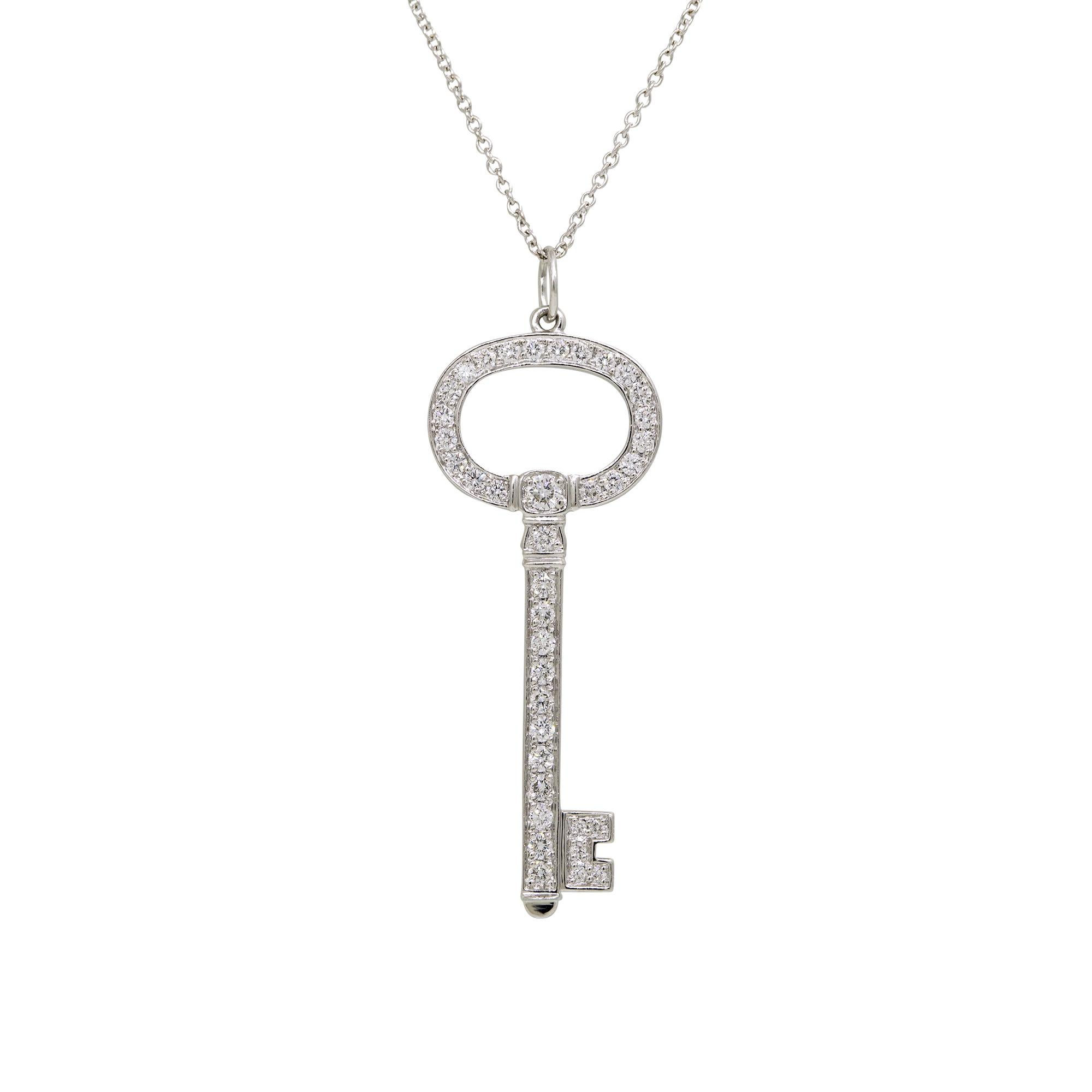 Round Cut Tiffany & Co. Natural 0.58 Carat Diamond Oval Key Platinum Necklace In Stock For Sale