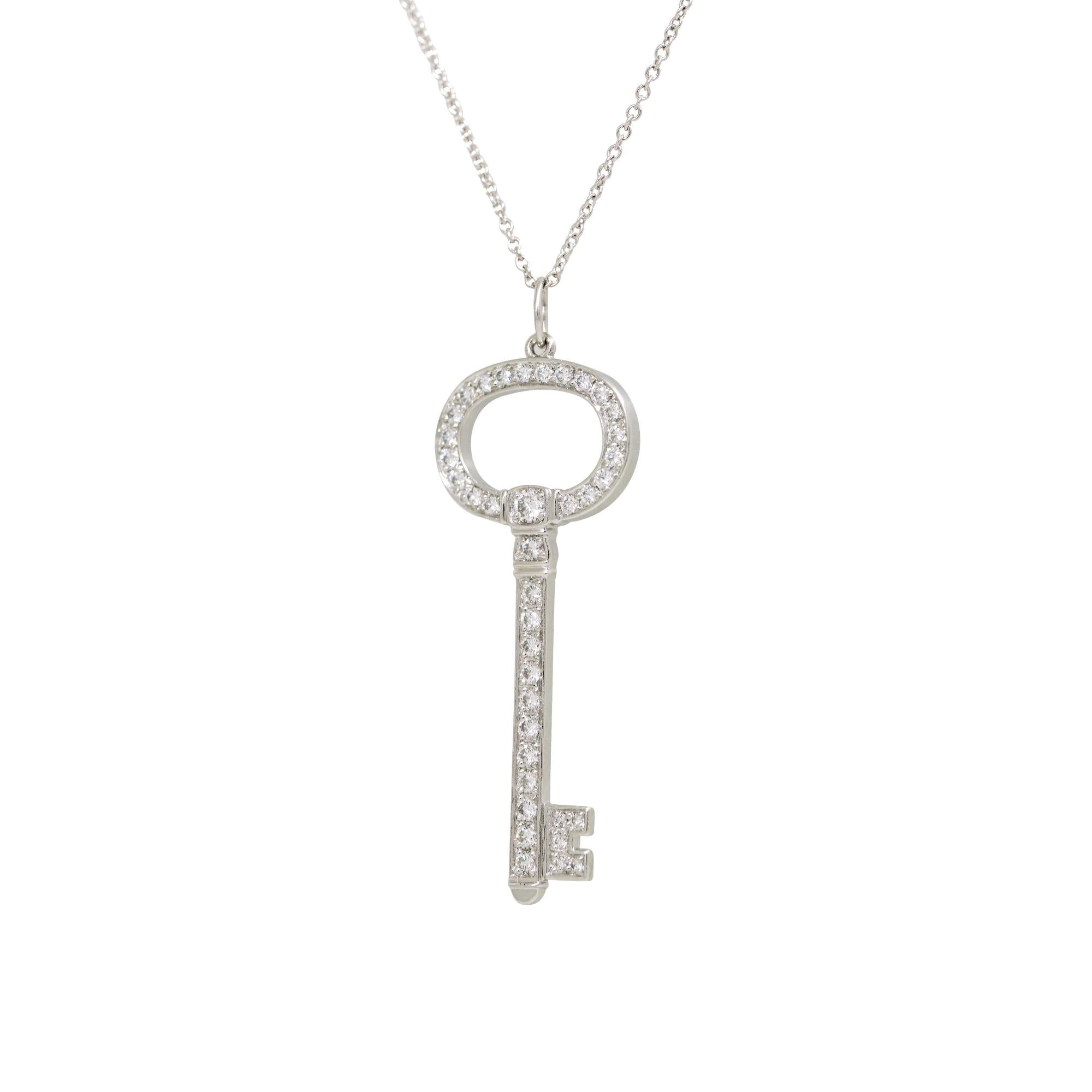 Tiffany & Co. Natural 0.58 Carat Diamond Oval Key Platinum Necklace In Stock In Excellent Condition For Sale In Boca Raton, FL