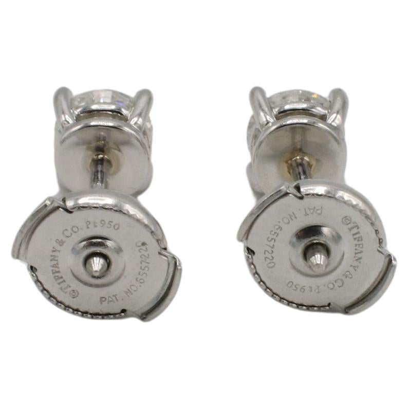 Tiffany & Co. Platinum Natural Round Diamond 1.11 Carat G VVS1-2 Stud Earrings 
Metal: Platinum
Weight: 3.5 grams
Diamonds: 0.56 carat G VVS1, 0.55 carat G VVS2 round natural diamonds
Backs: Posts
Retail: $11,700 USD (2018)
Note: Box, receipt,