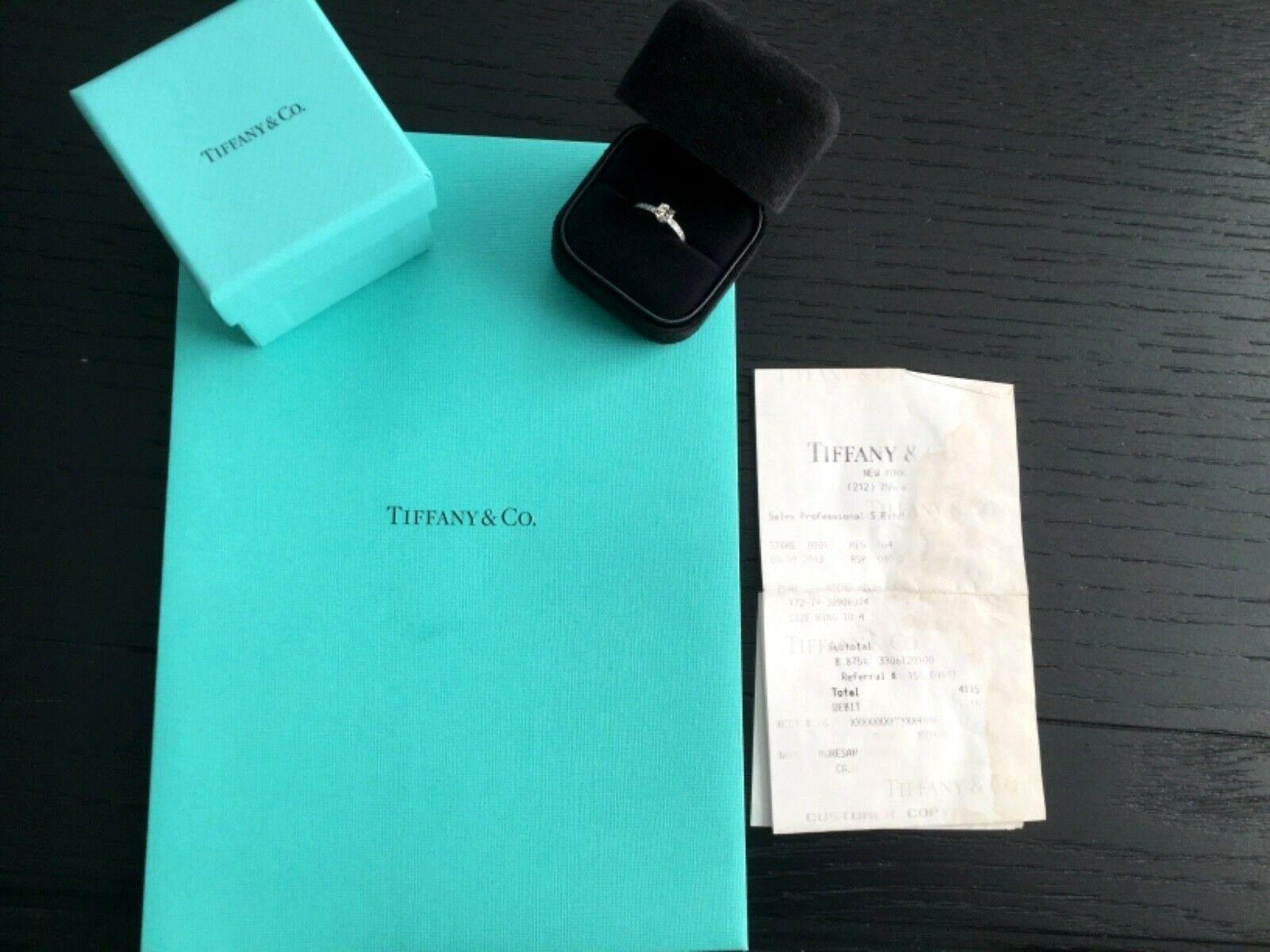 Being offered for your consideration is a like new Tiffany & Co Platinum and Diamond NOVO engagement ring.  The Tiffany NOVO is one of the hottest and most sought after designs.  This beautiful ring has a natural, cushion cut diamond that is  .40