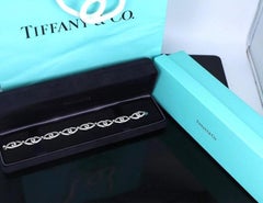 Tiffany & Co. Platin-Pavé-Diamant-Interlock-Bogen-Armband