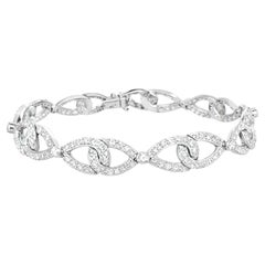 Tiffany & Co. Platinum Pavé Diamond Interlock Bow Bracelet