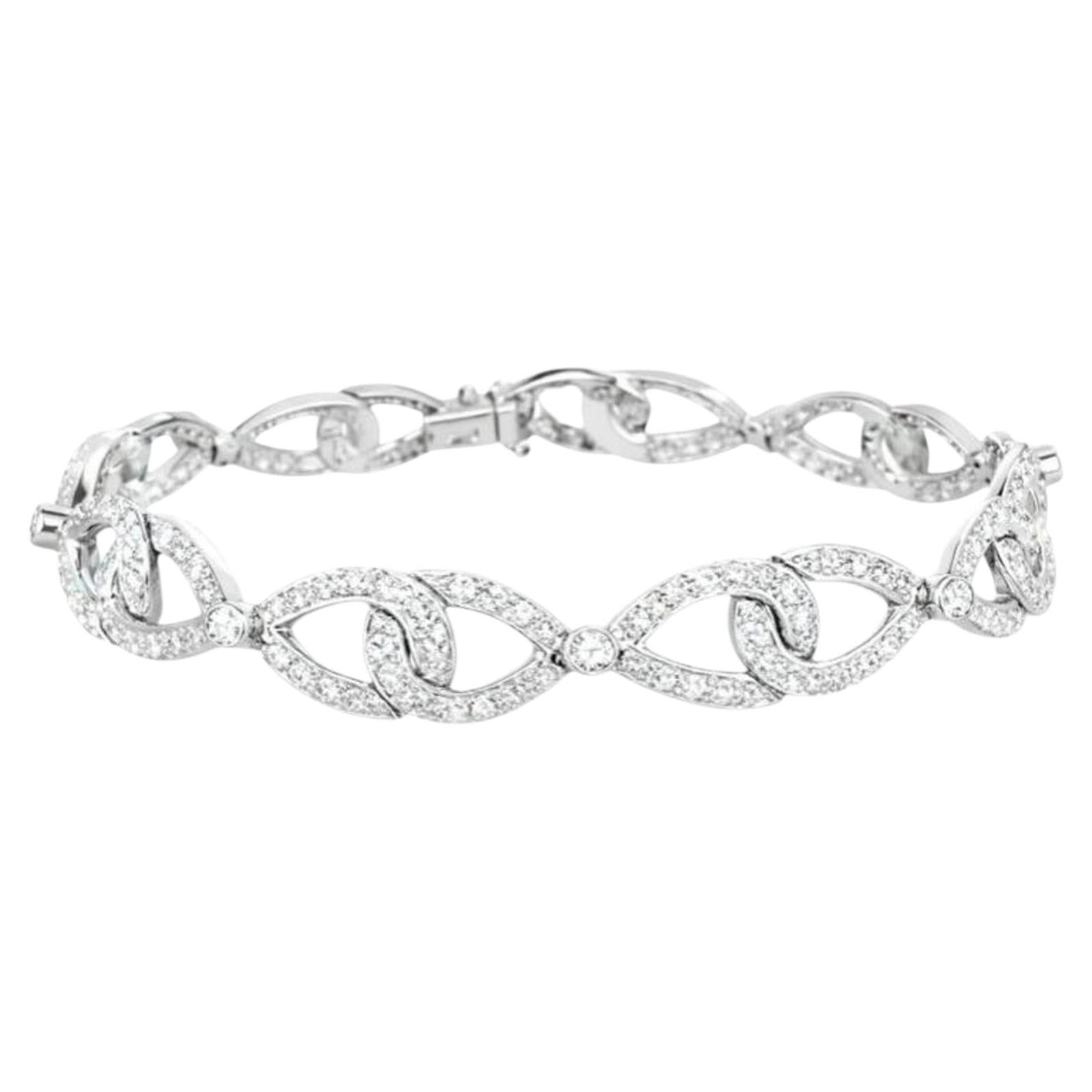 Tiffany & Co. Platinum Pavé Diamond Interlock Bow Bracelet For Sale