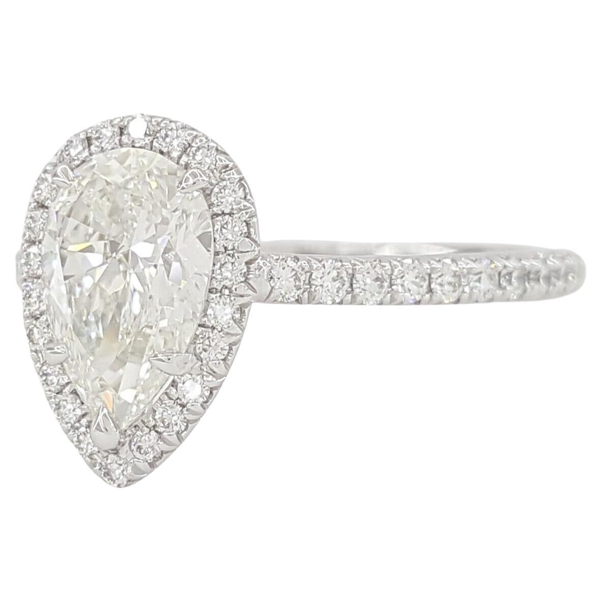 Tiffany & Co. Platinum Soleste® 1.36 ct Pear Diamond Halo Engagement Ring.

The ring weighs 3.4 grams, size 5.5, the center stone is a Natural 1.05 ct Pear Brilliant Cut Diamond,