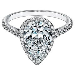 Tiffany & Co. Platin Verlobungsring mit birnenförmigem Diamant-Halo.
