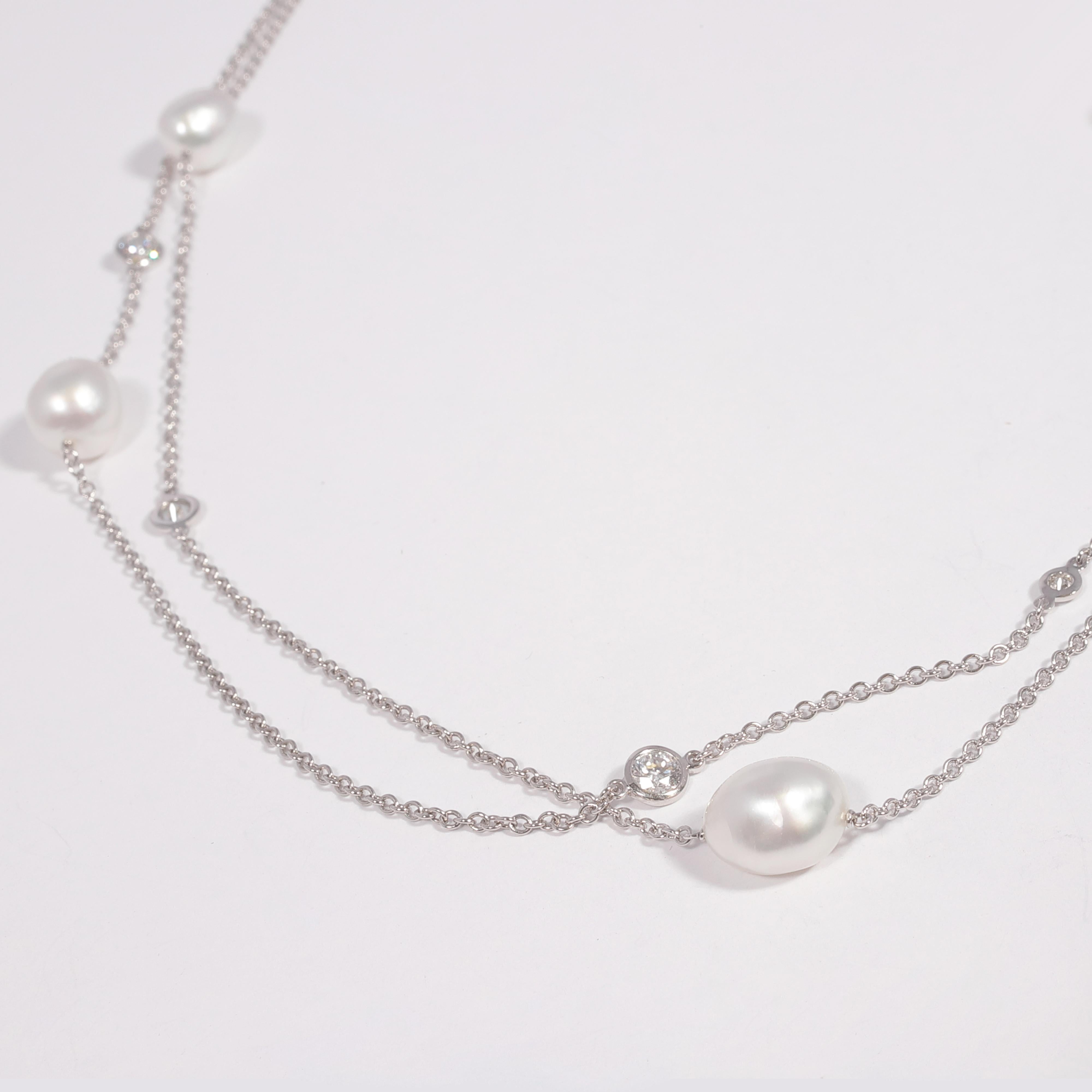 Such an iconic look!  Always timeless from Tiffany & Company, this platinum necklace features five freshwater pearls and seven bezel-set, round diamonds and is secured with a toggle clasp.  The diamonds have a total stated weight of 0.85 cts. 