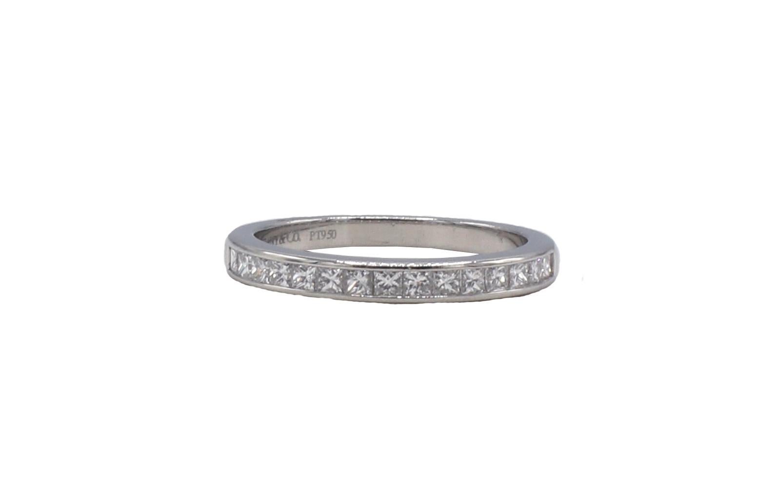 Tiffany & Co. Platinum Princess Cut Channel Set Diamond Half  Band Ring 
Metal: Platinum
Diamonds: Approx. .33 CTW F-G VS
Size: 5.5 (US)
Weight: 3.4 grams
Width: 2.6mm 
Retail: $3,900 USD

