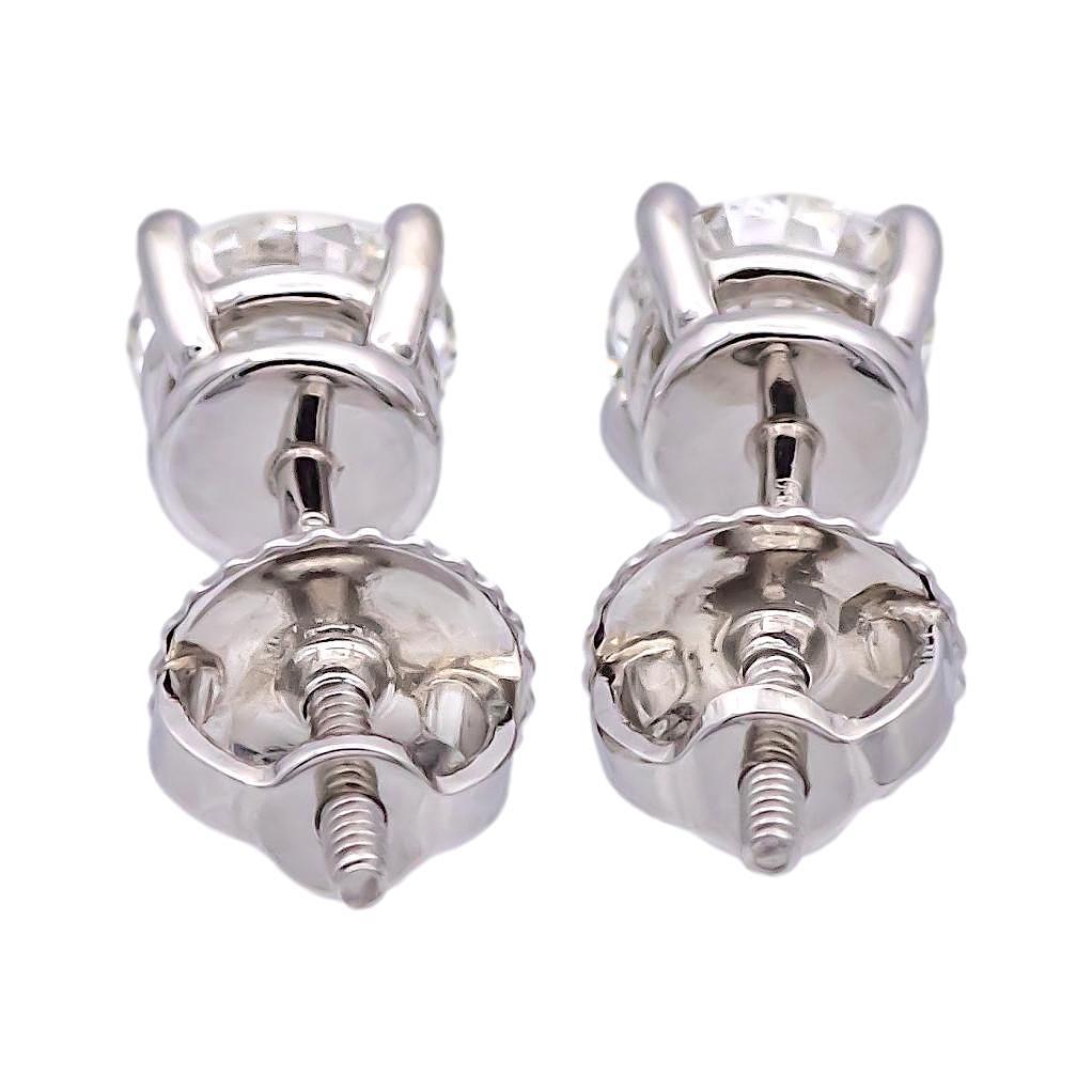 Modern Tiffany & Co. Platinum Round 0.95Cts. TW VVS1 Diamond Solitaire Stud Earrings