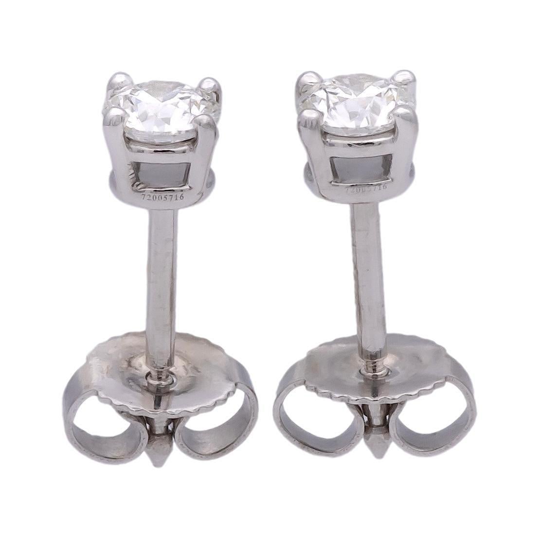 Tiffany & Co. Platinum Round .62 Cts. TW Diamond FVS1 Solitaire Stud Earrings In Good Condition In New York, NY