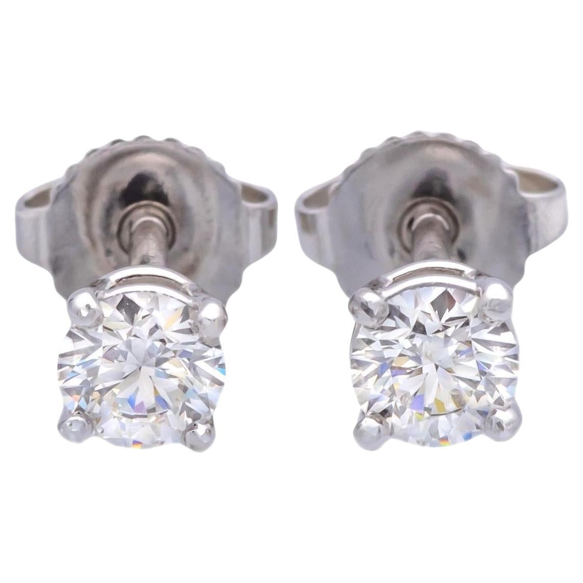 Tiffany & Co. Platinum Round .62 Cts. TW Diamond FVS1 Solitaire Stud Earrings