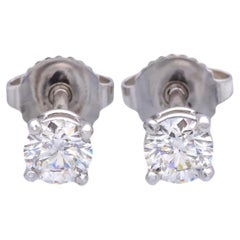 Used Tiffany & Co. Platinum Round .62 Cts. TW Diamond FVS1 Solitaire Stud Earrings