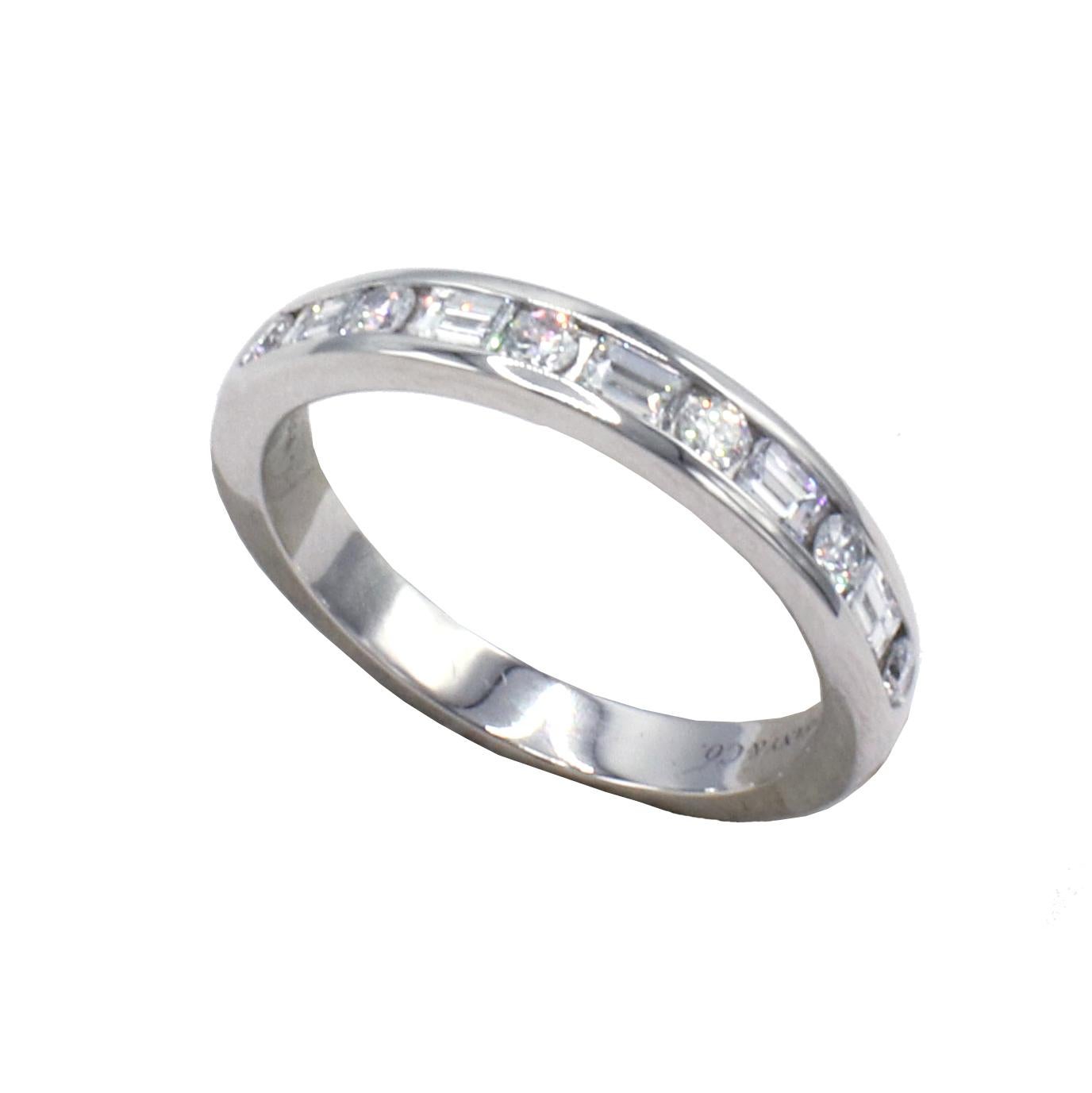 Tiffany & Co. Platinum Round and Baguette Natural Diamond Wedding Band Ring 
Metal: Platinum, PT950
Weight: 6.12 grams
Diamonds: Approx. .65 CTW round and baguette F-G VS natural diamonds 
Size: 8 (US)
Width: 3.5mm
Retail $4,100 USD

