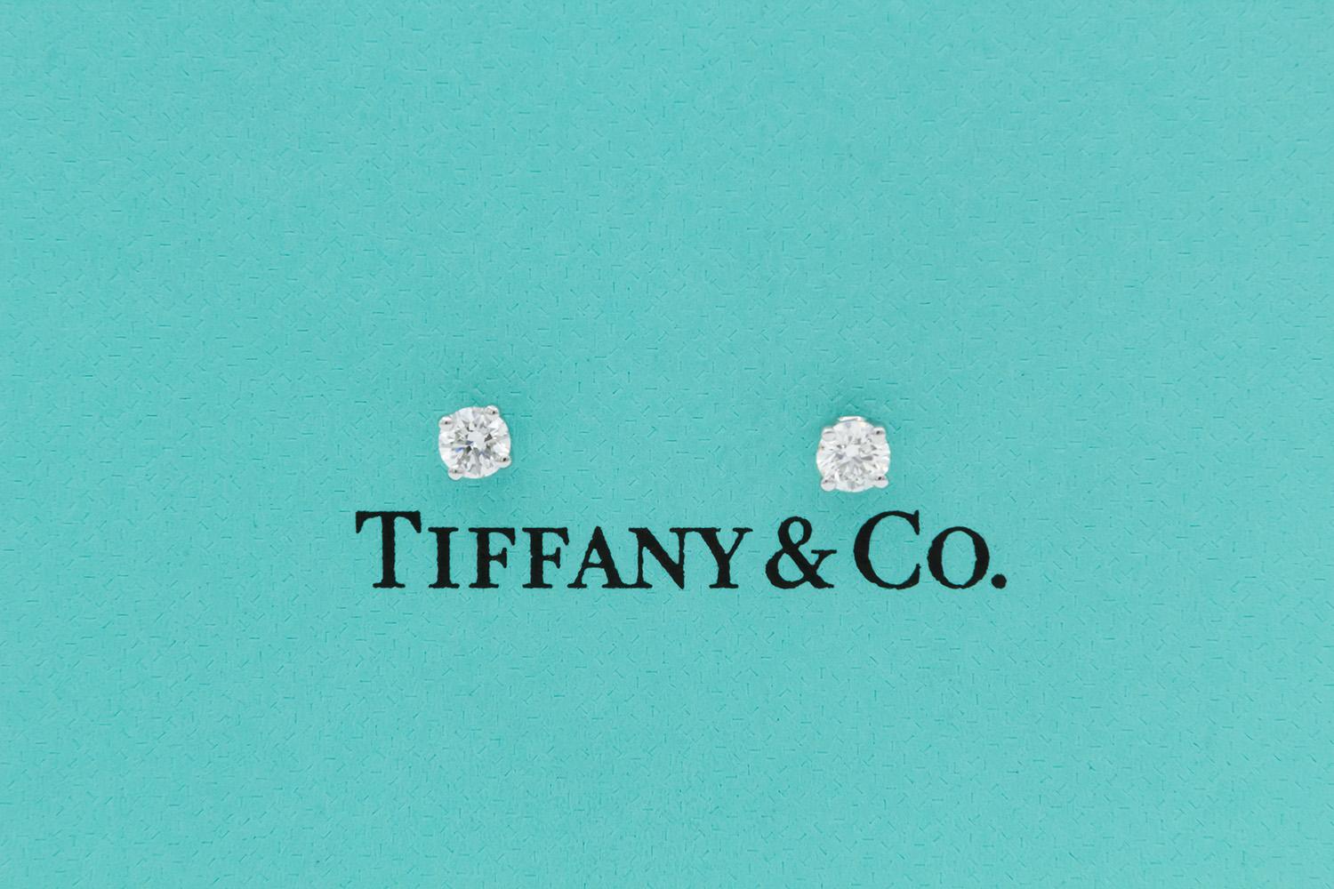 We are pleased to present these Tiffany & Co. Platinum & Round Brilliant Cut Diamond Stud Earrings. These beautiful earrings feature an estimated 0.35ctw F/VS Tiffany & Co. Round Brilliant Cut Diamonds set in platinum 4 prong studs with screw back