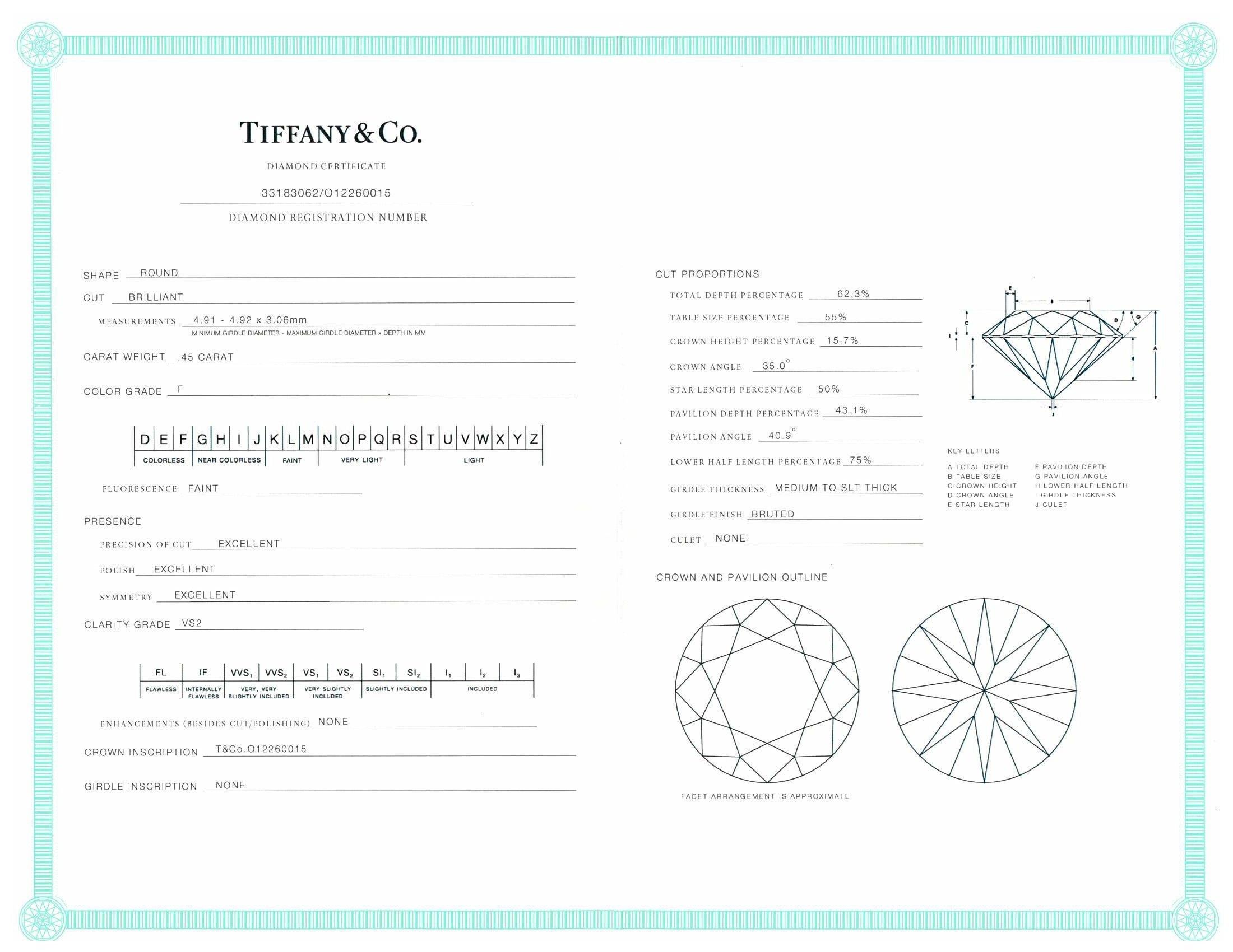Tiffany & Co. Bague de fiançailles en platine avec diamant rond Bande de diamant .73cts tw FVS2 Excellent état - En vente à New York, NY
