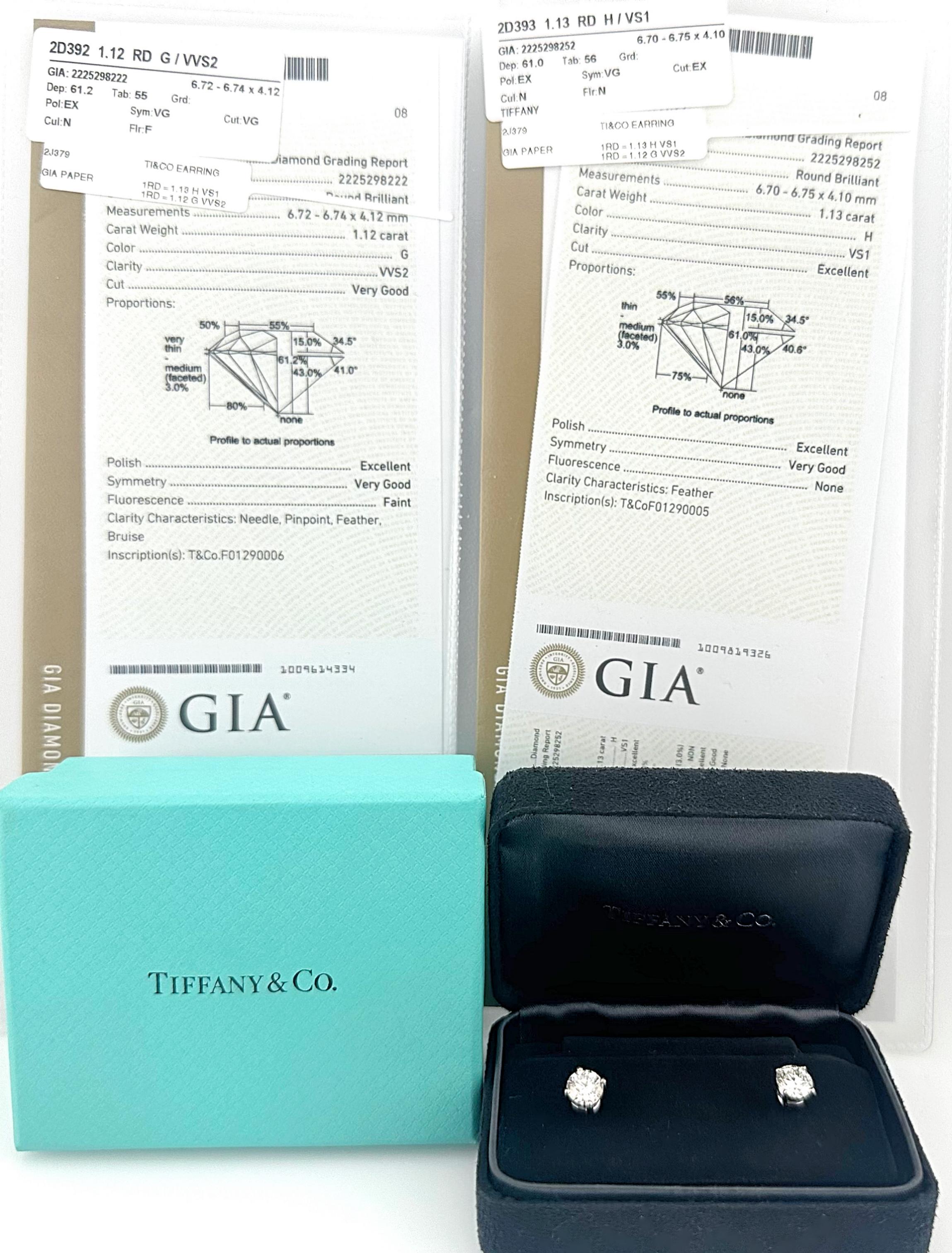 Tiffany & Co Classic Stud Round Brilliant Diamond Earrings
Style:  Prong Set
Metal:   Platinum Pt950
TCW:  2.25 tcw
Diamond 1:  Round Brilliant 1.12 G - VVS2 GIA F01290006
Diamond 2:  Round Brilliant 1.23 H - VS1 GIA F01290005
Both Diamonds have